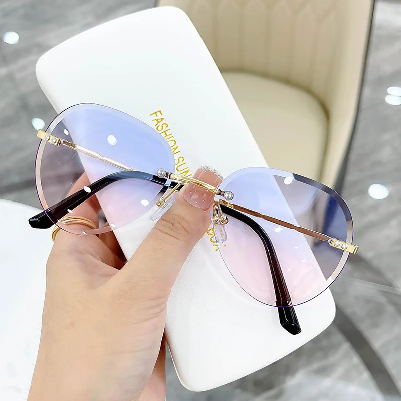 Lmamba Custom Logo Rimless Sunglasses Metal Frame Women Sun Glasses Street Beat Trendy Sunglasses 2021
Lmamba Custom Logo Rimless Sunglasses Metal Frame Women Sun Glasses Street Beat Trendy Sunglasses 2021