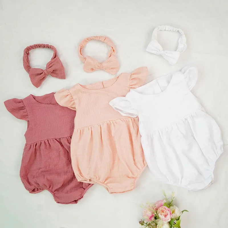 100% cotton Cute Baby Clothes Jumpsuits Plain Baby Romper Newborn Baby Clothes With Headband set
100% cotton Cute Baby Clothes Jumpsuits Plain Baby Romper Newborn Baby Clothes With Headband set