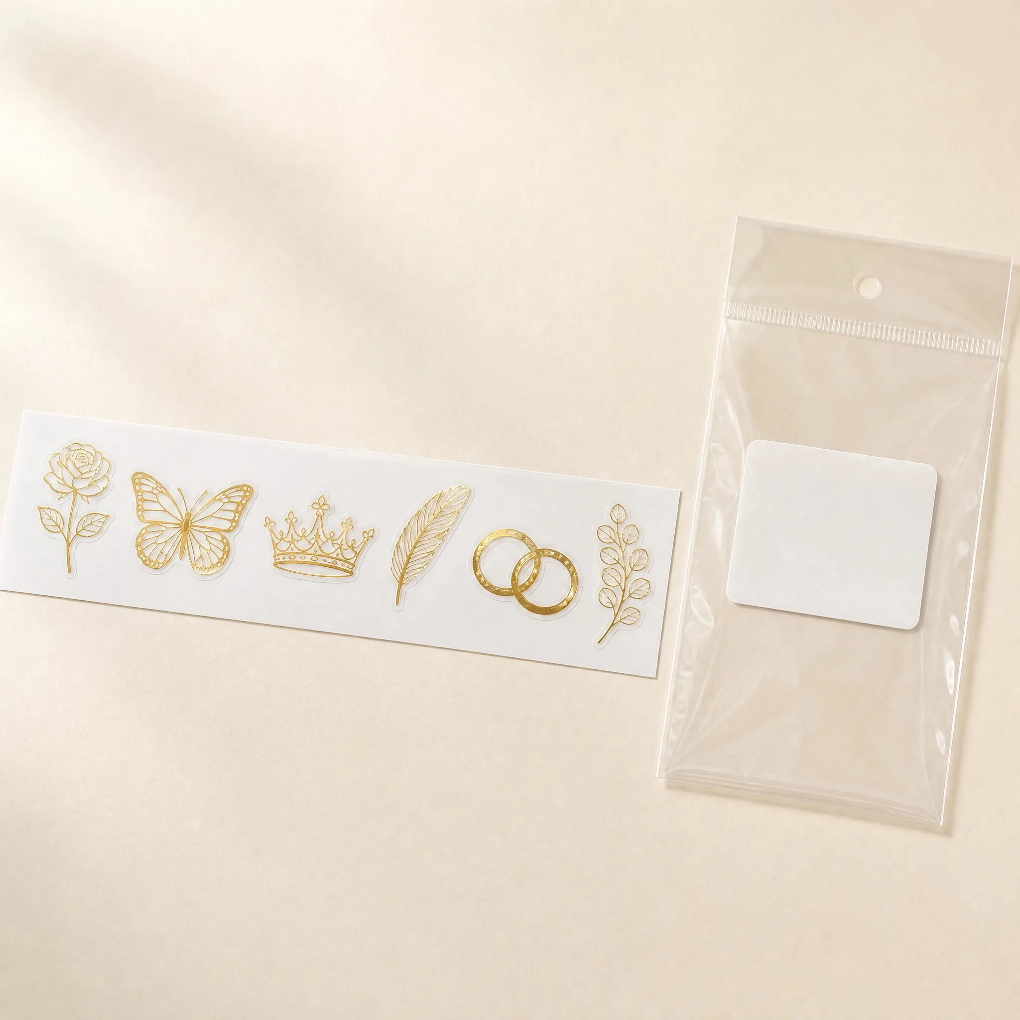 Gold foil sticker set on backing card with transparent packaging bag