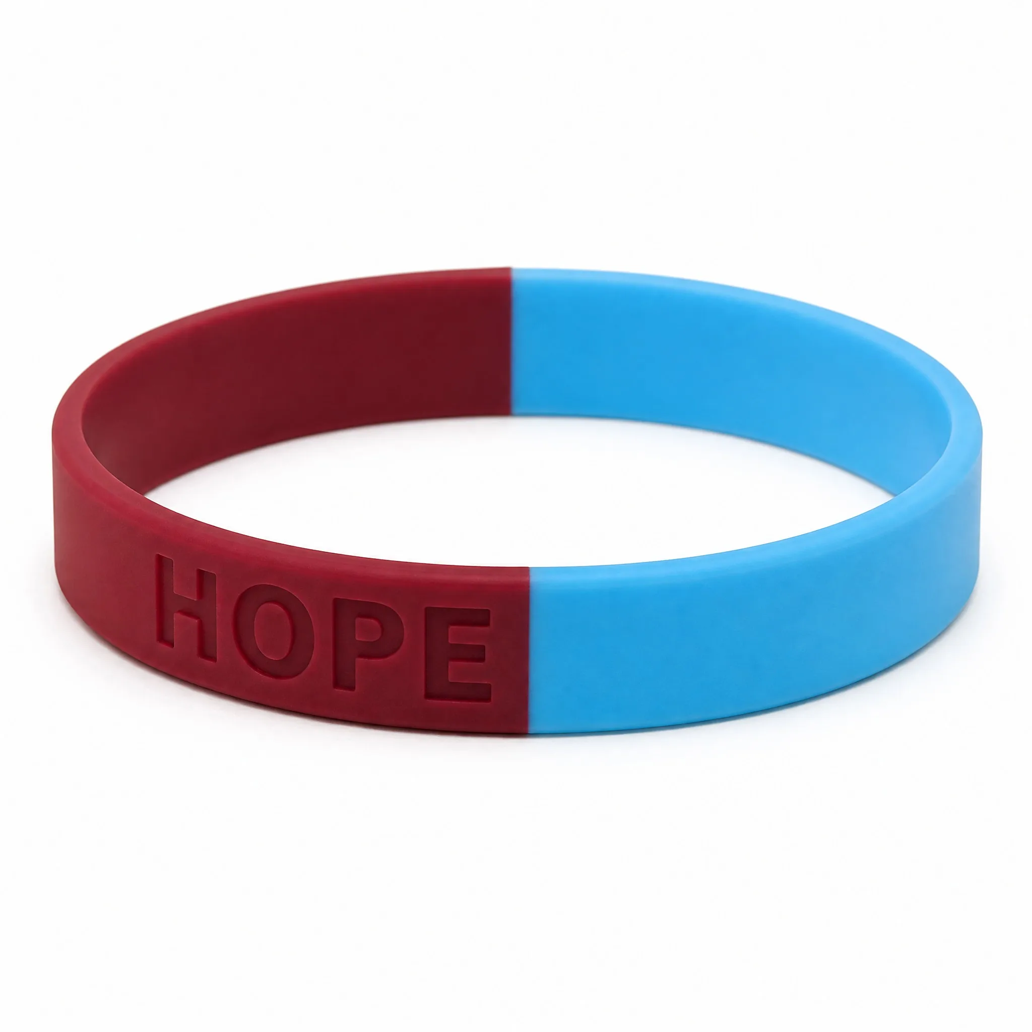 Custom two-tone silicone bracelet half wine red half sky blue with debossed HOPE on white background