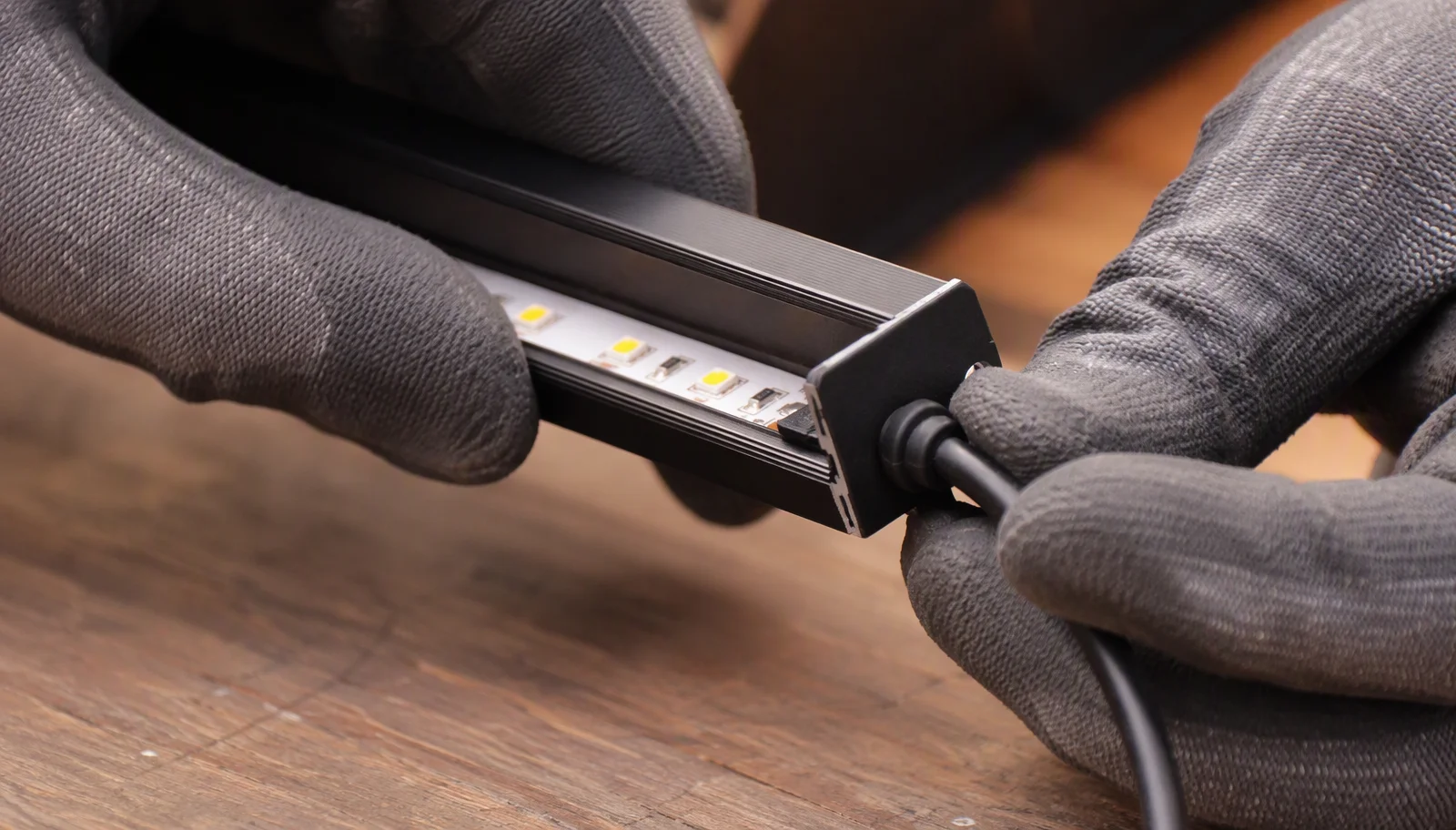Waterproof LED strip end cap and sealed cable entry detail for a protected wet-location installation