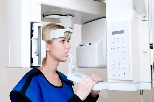 Dental panoramic and CBCT imaging equipment in a clinical setting