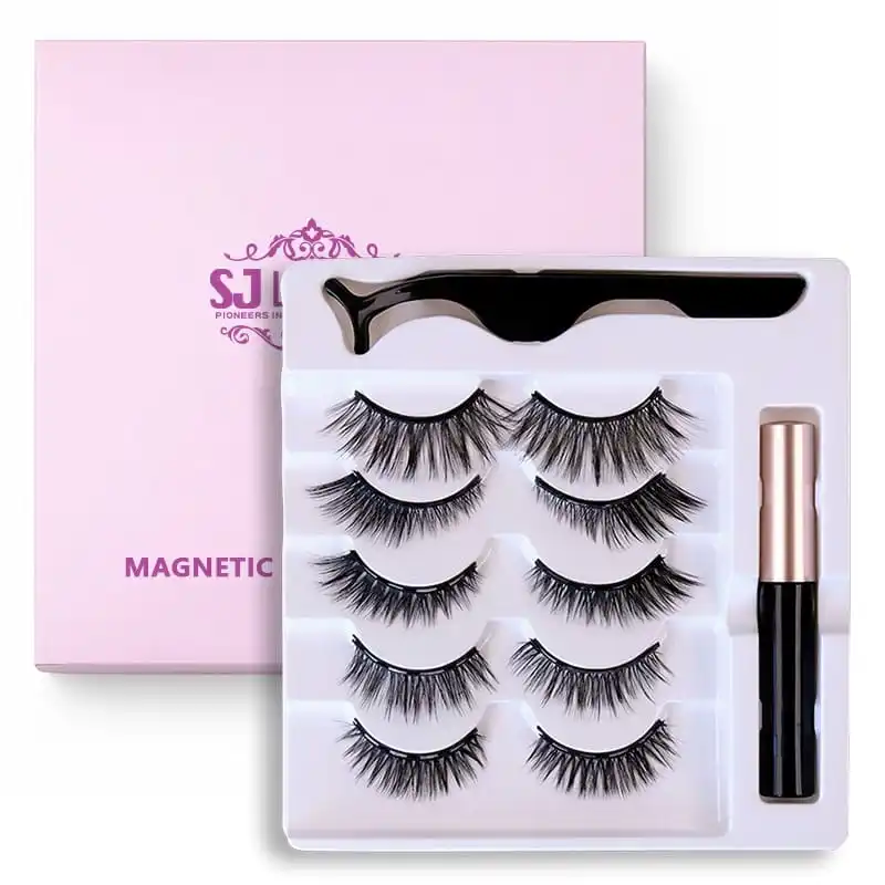 Magnetic lash kit box with the white tray of five pairs, curved applicator and eyeliner tube displayed beside the closed pink box with the SJ LASHES logo - magnetic lash and eyeliner kit box set