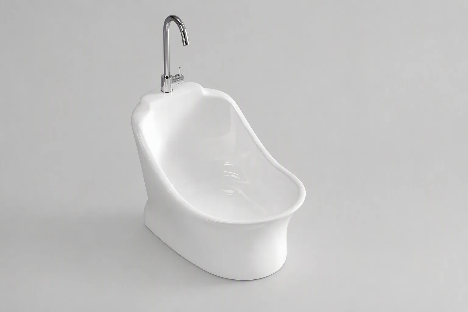 Low oval white ceramic wudu basin on a clean studio background