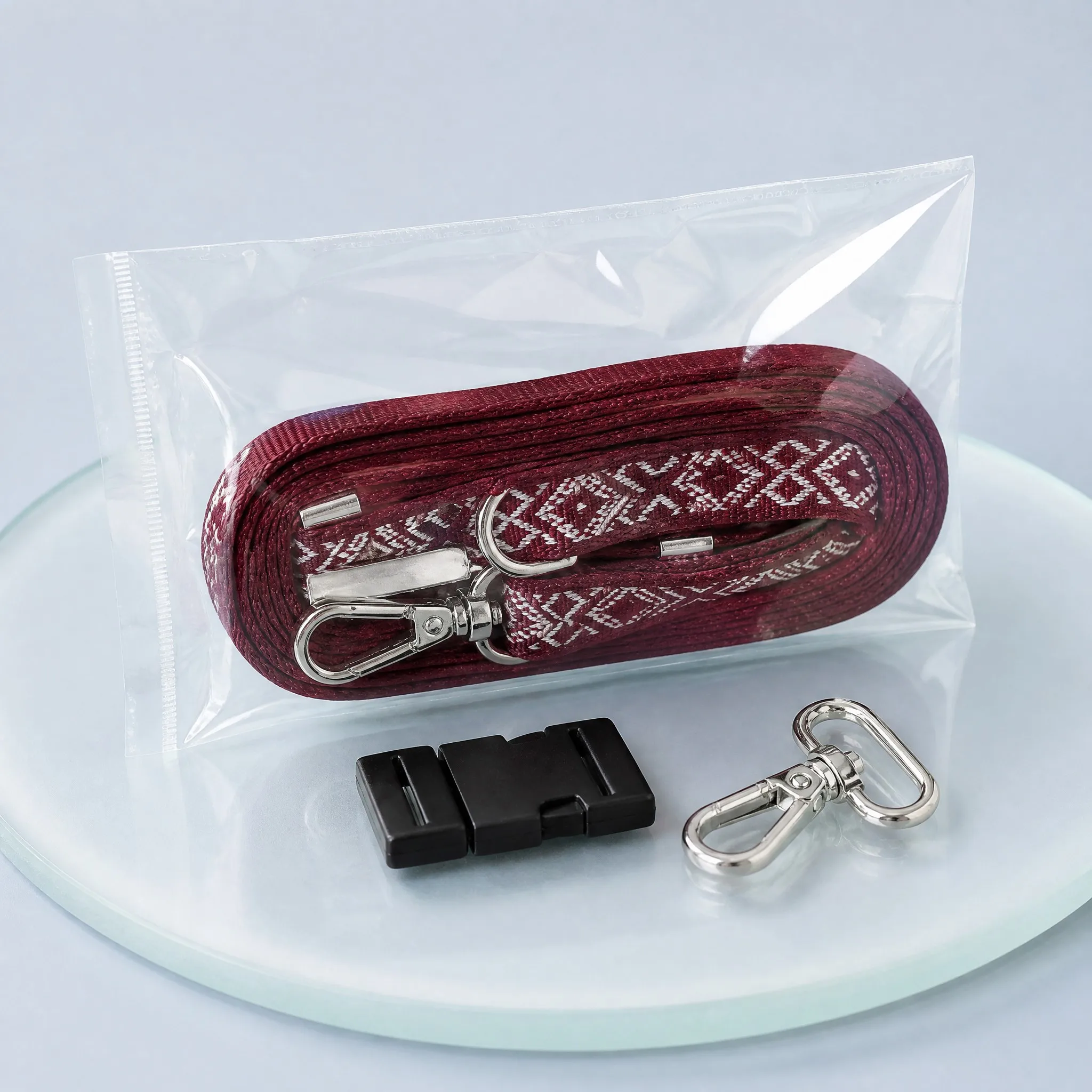 Woven lanyard packed in transparent OPP bag with spare breakaway buckle and extra swivel clip