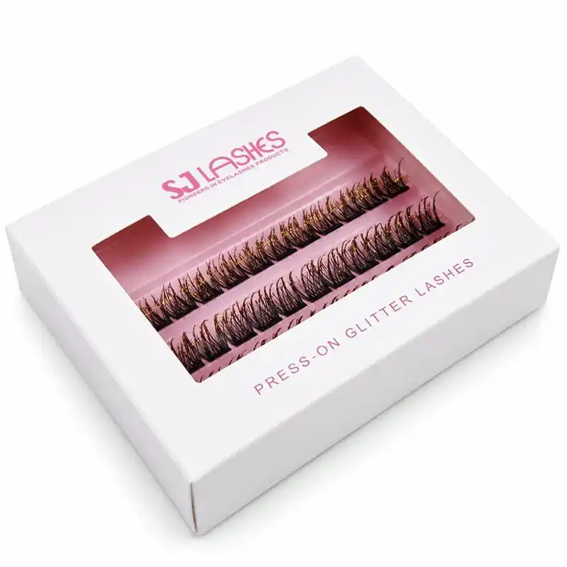 White window box with pink tray holding three rows of gold glitter press-on lash segments - custom glitter lash window box