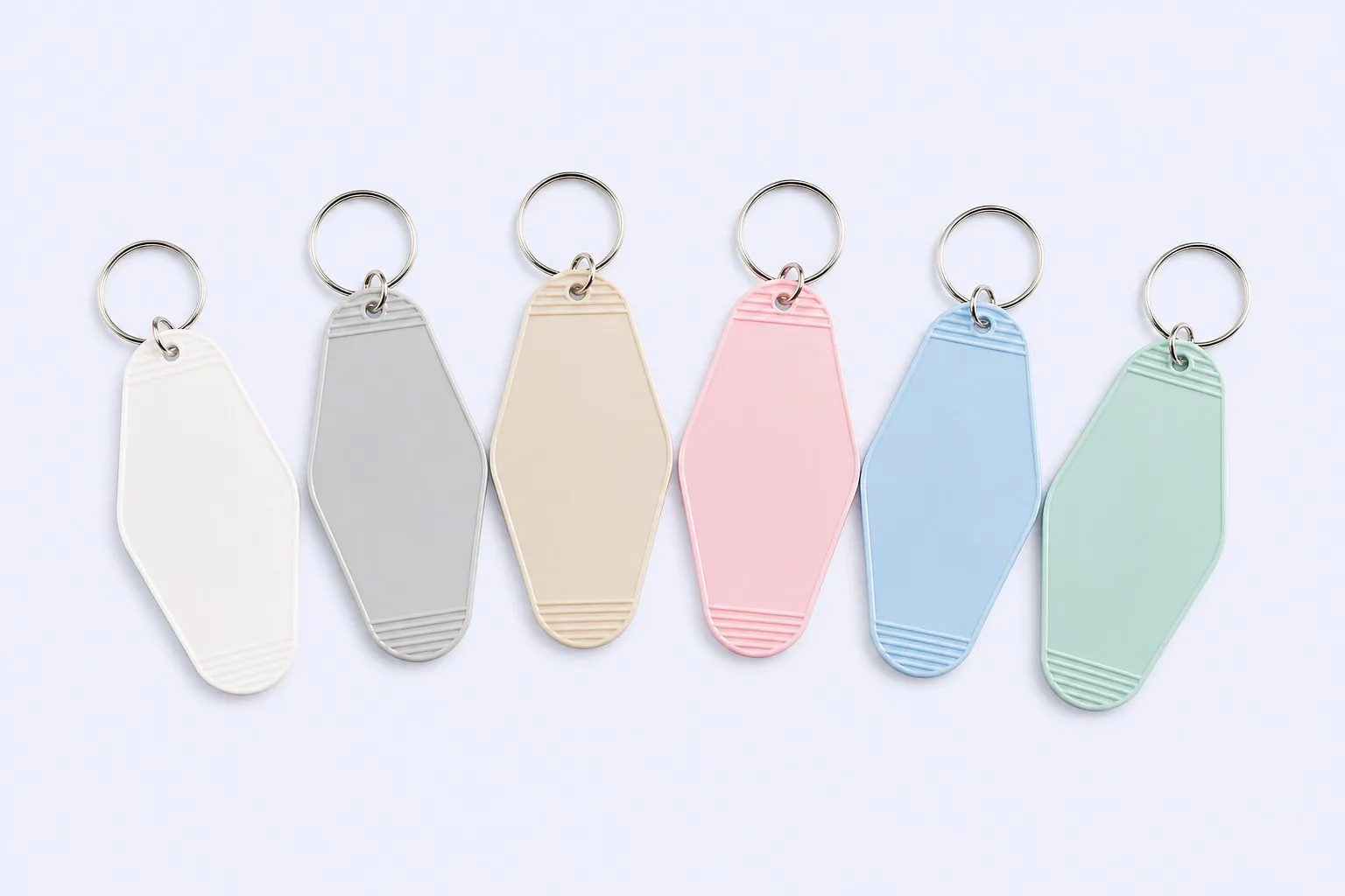 Blank motel key tags in multiple solid base colors