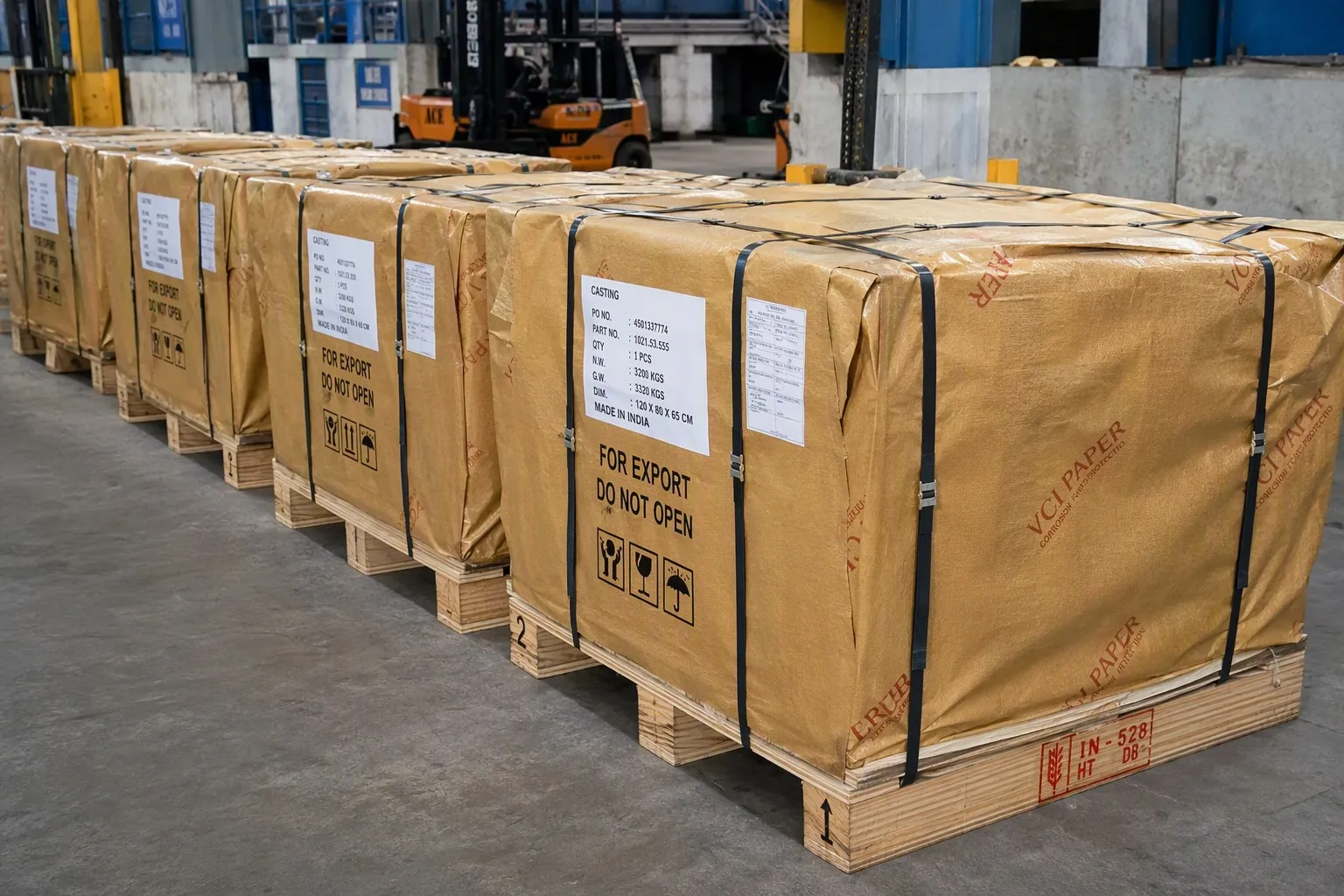 Export-ready metal castings securely packed on pallets for international shipping