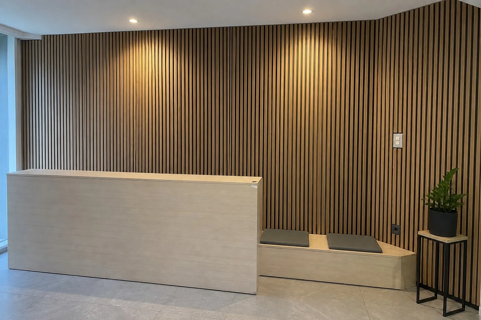 PET felt vs wood slat acoustic panels in wood-led interiors
