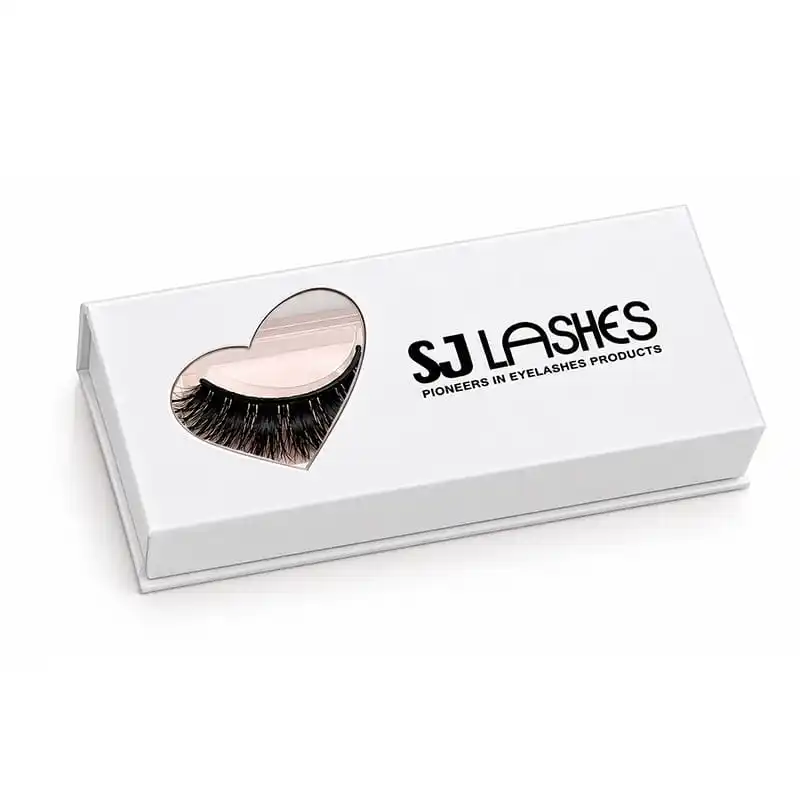 Closed white single pair lash gift box with a heart shaped cut out in the lid showing the pair of lashes through it, brand wordmark printed beside the heart - heart window lash gift box