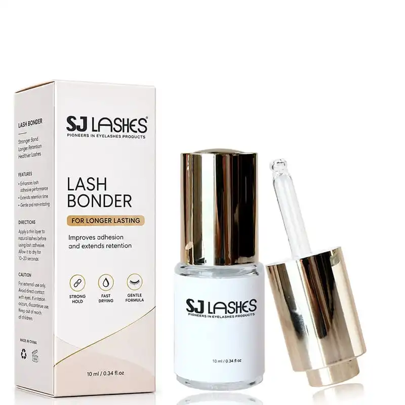 Lash bonder white bottle with gold metallic cap and glass dropper beside its matching white paper box printed with features, directions and caution - custom private label lash bonder packaging