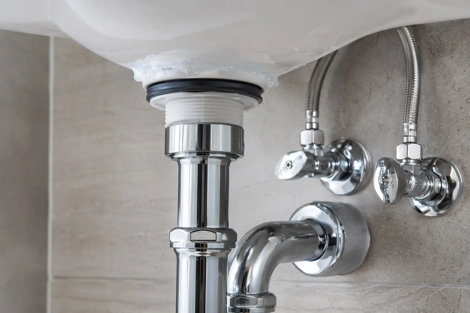 info-1-1 Wall-mount sink drain seal and braided stainless steel supply line connections