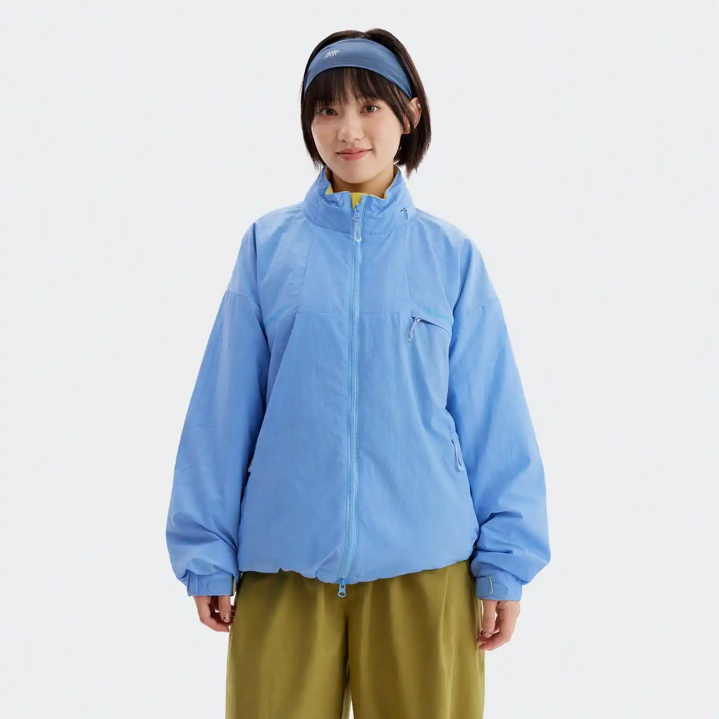 Salt Blue reversible outdoor utility jacket worn by a model