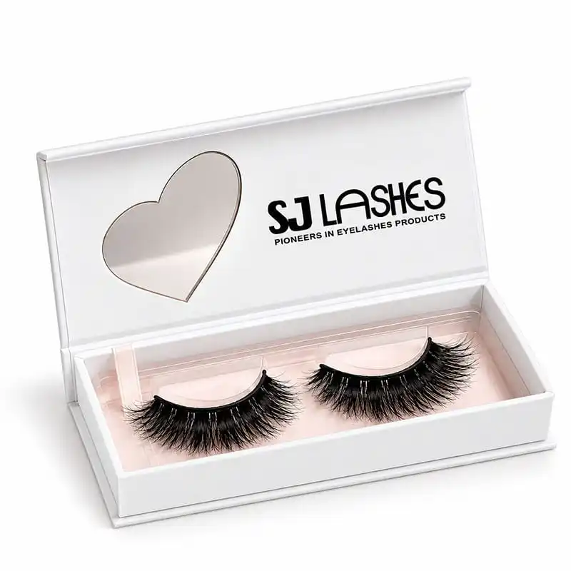 Open white single pair lash gift box showing the heart aperture in the lid, brand wordmark printed on the lid interior and one pair of lashes in the pink lined base - single pair lash gift box open