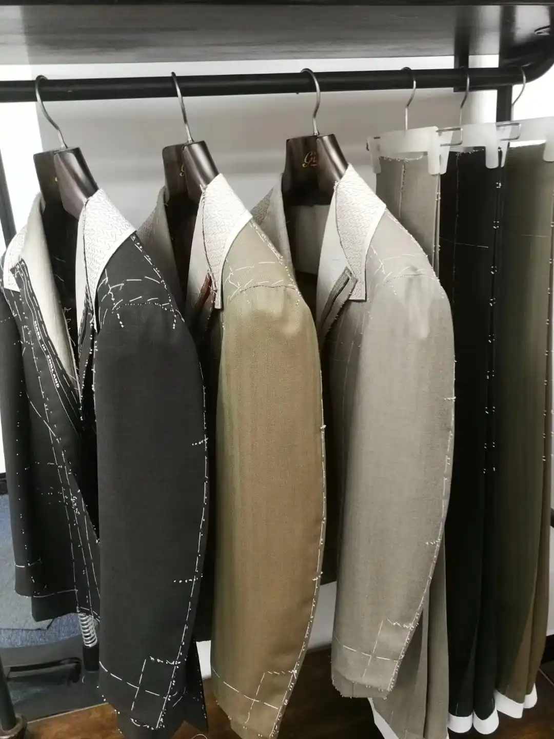 Hand-stitching detail on bespoke suit lapel