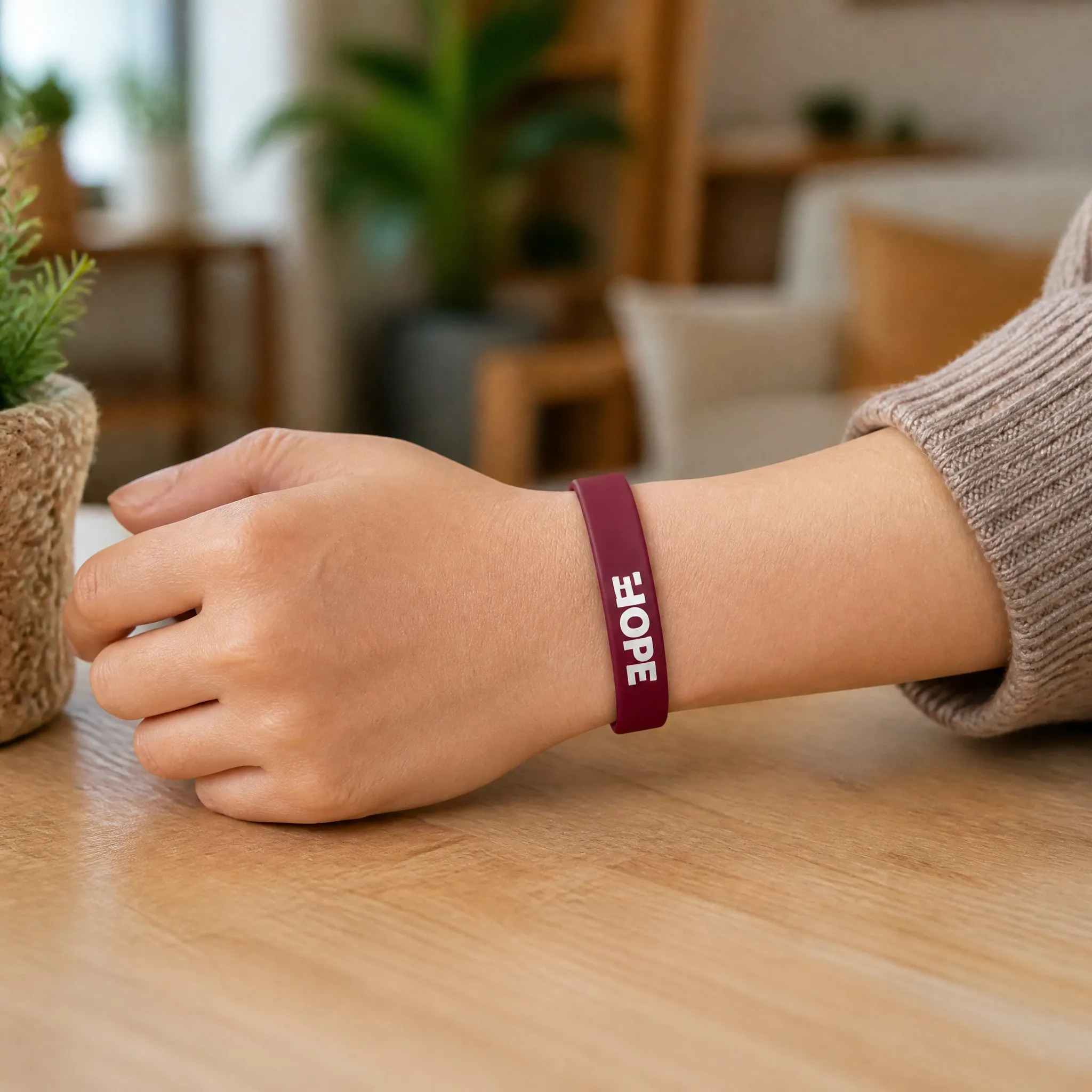 Silk screen printed silicone bracelet worn on wrist in daily scene