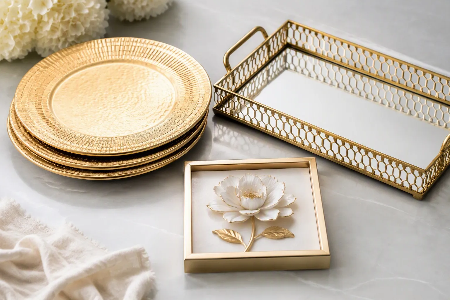 Home décor products flat-lay ready for e-commerce listing with charger plates tray and wall décor