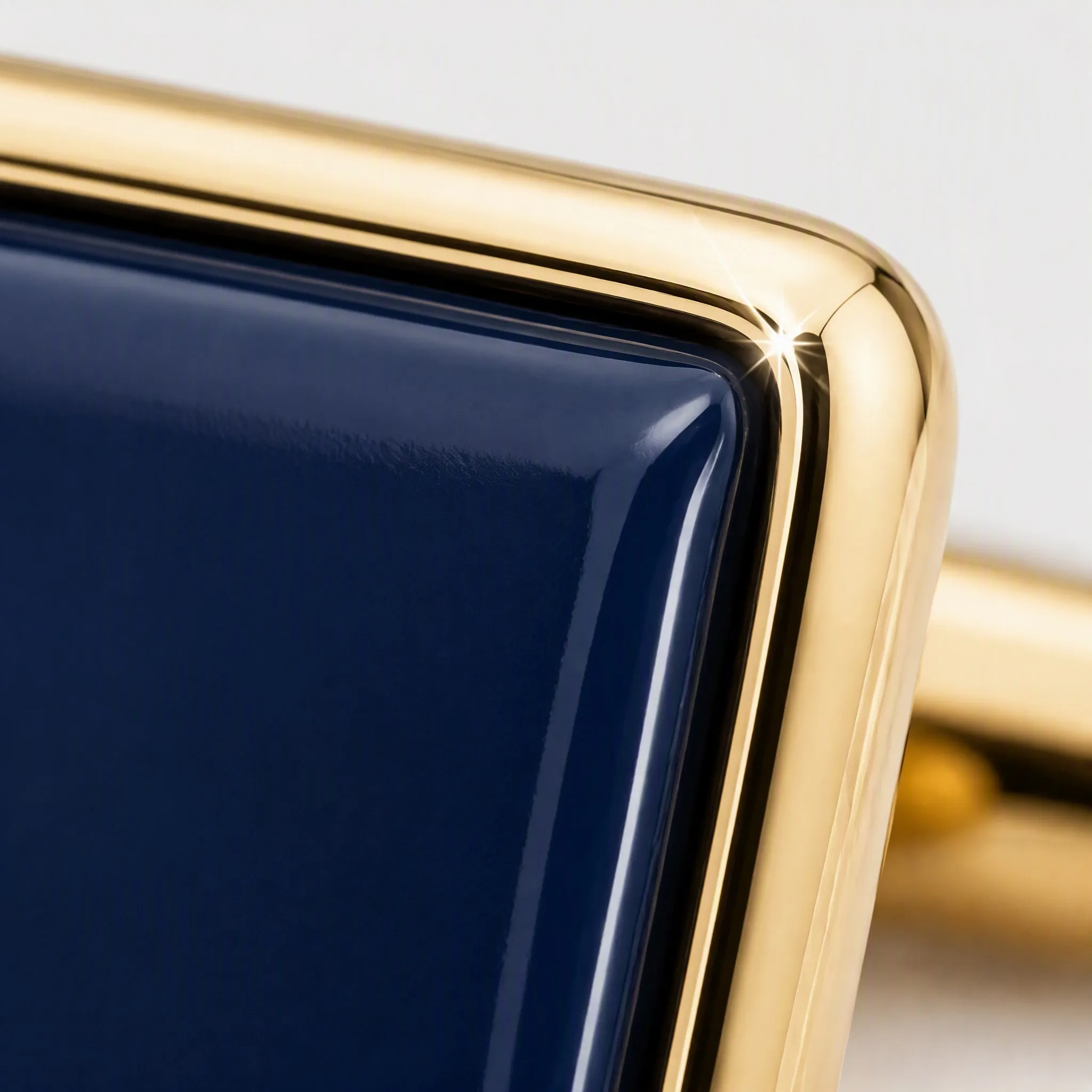 Macro detail of hard enamel cufflink surface