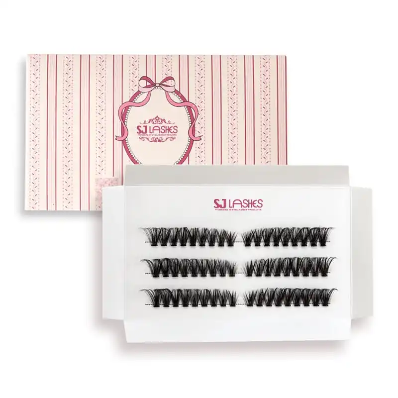 Elegant striped pink lash sleeve with a bow and medallion brand mark beside the white lash card that slides into it, with a QR code printed on the sleeve - premium card and sleeve lash packaging