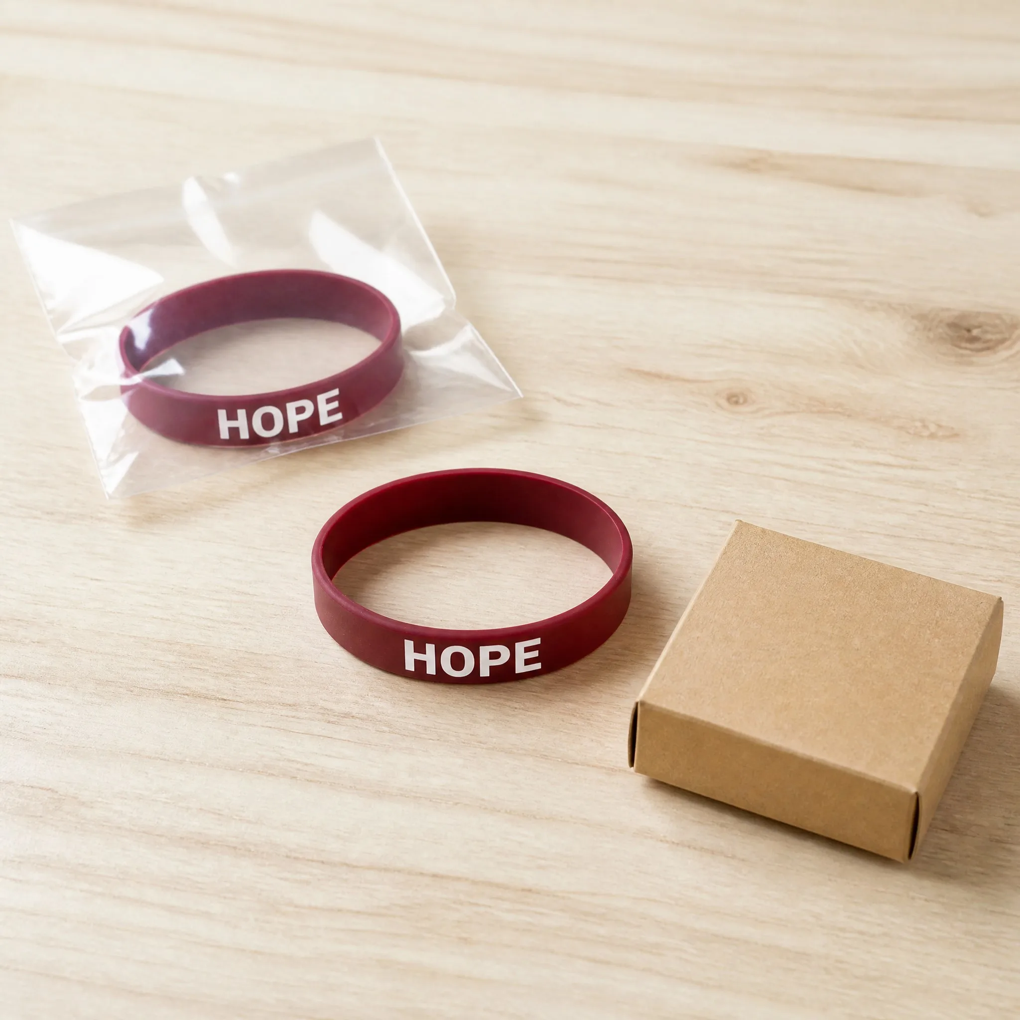Ink injected silicone bracelet in OPP pouch and kraft box packaging