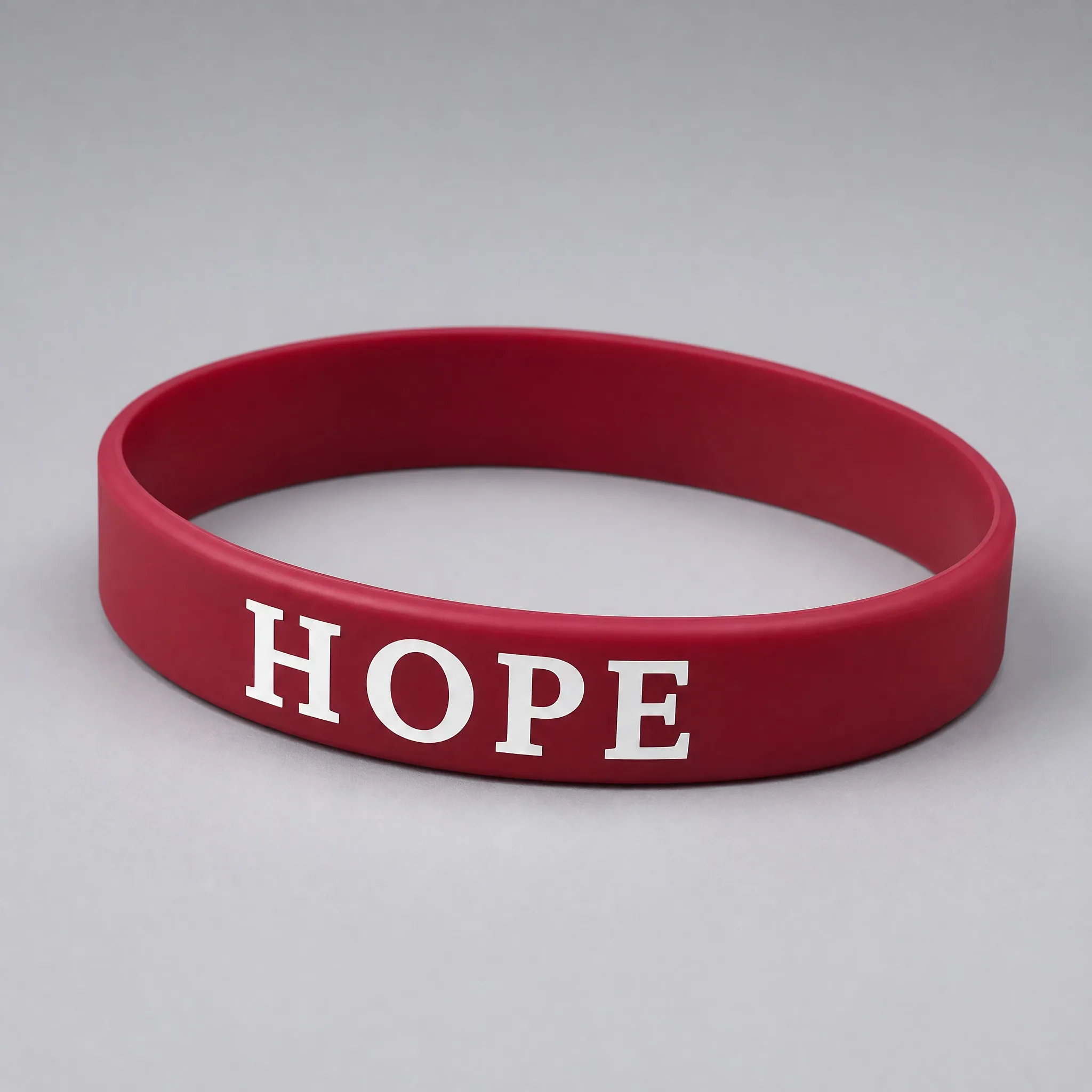 Three-quarter angle view of silk screen printed silicone bracelet