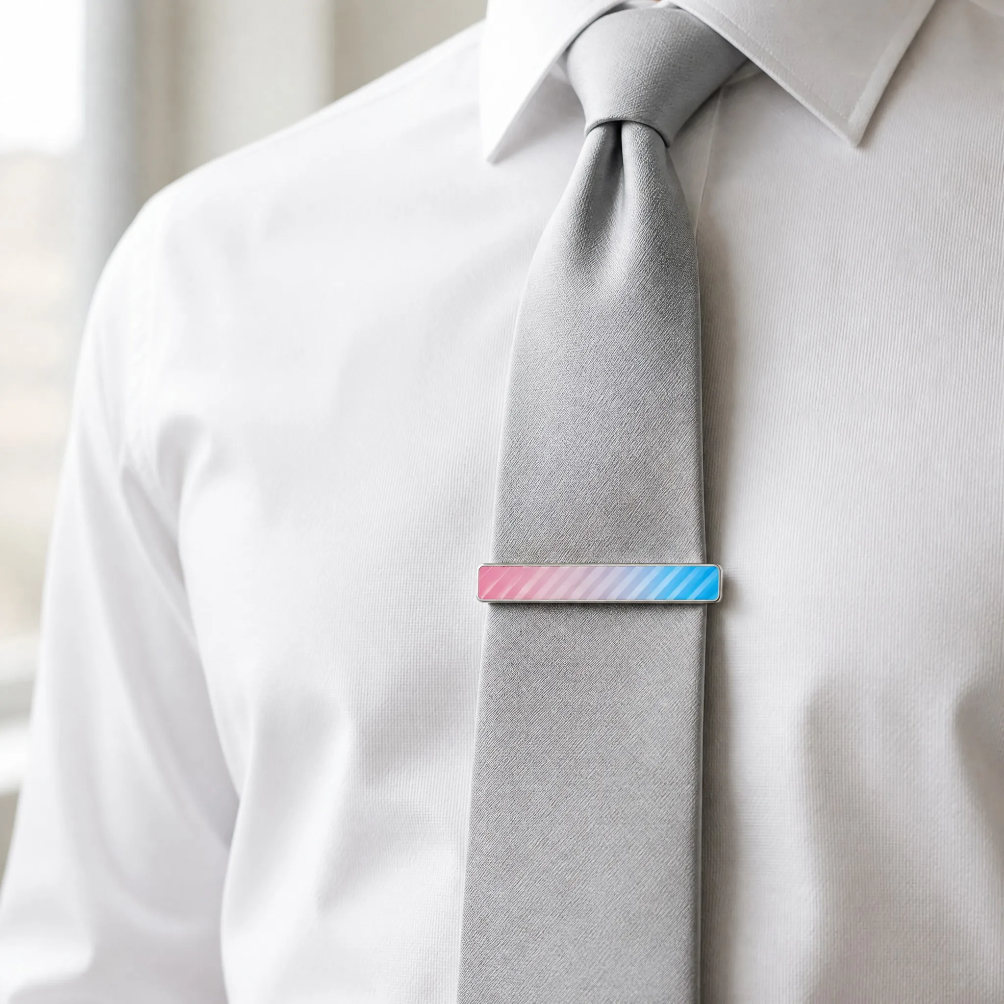 UV printed tie clip worn on light grey silk tie
