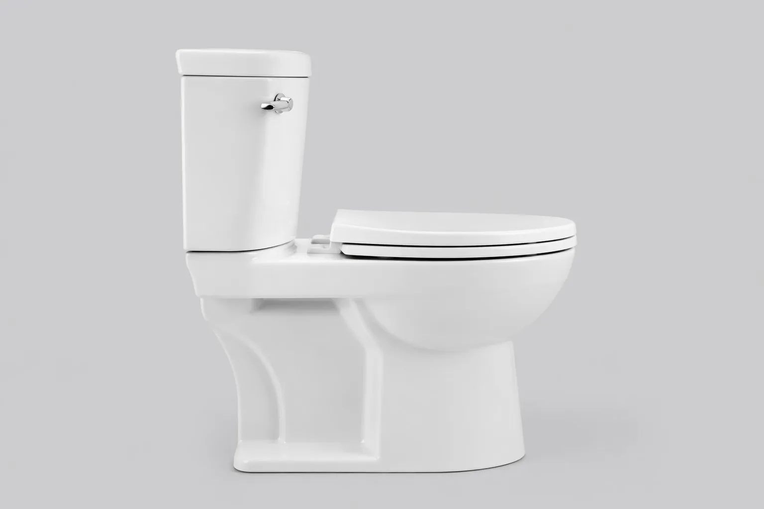 info-1-1 Two-piece short-projection compact toilet side profile showing compact depth
