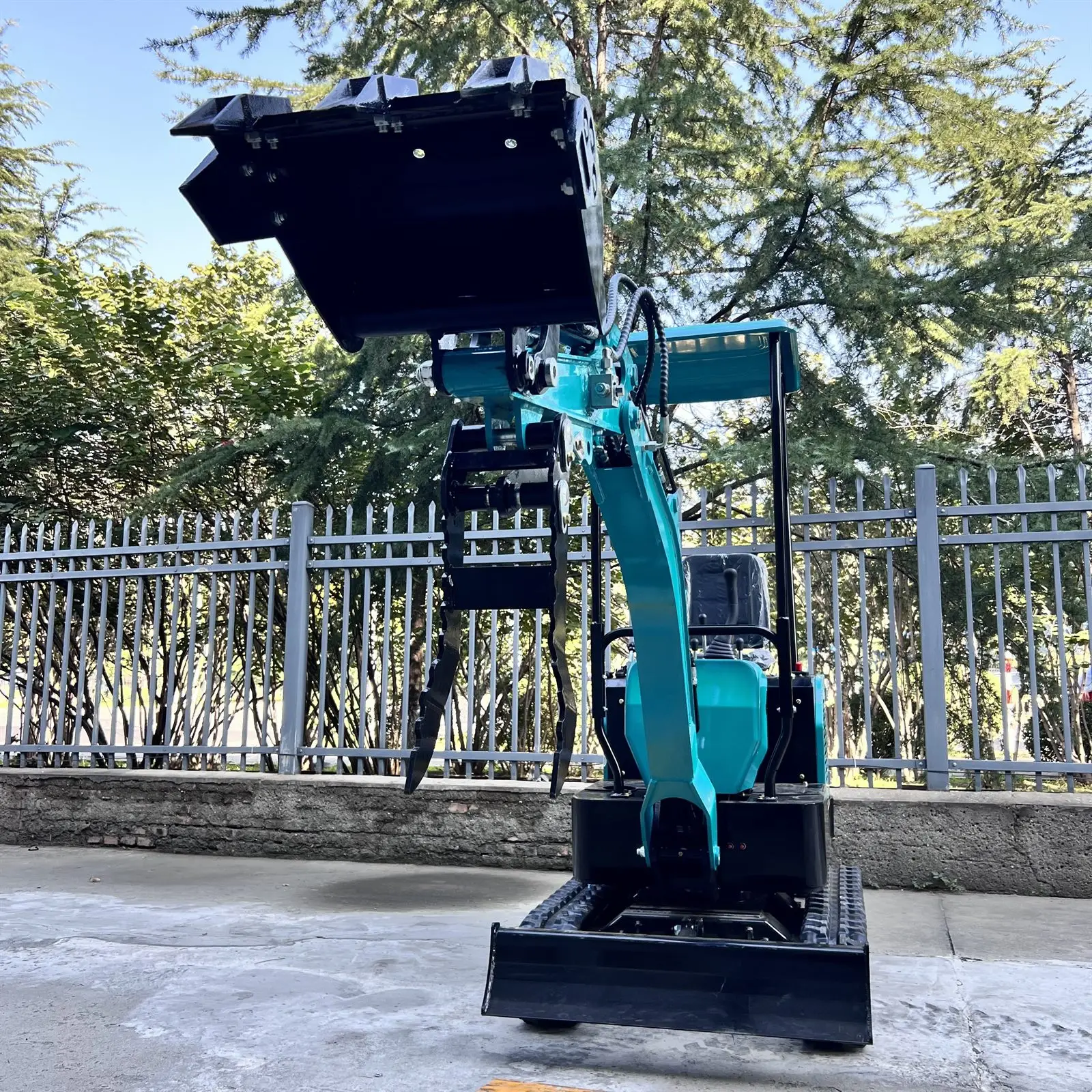 Compact mini excavator with a grapple, canopy build — standard unit