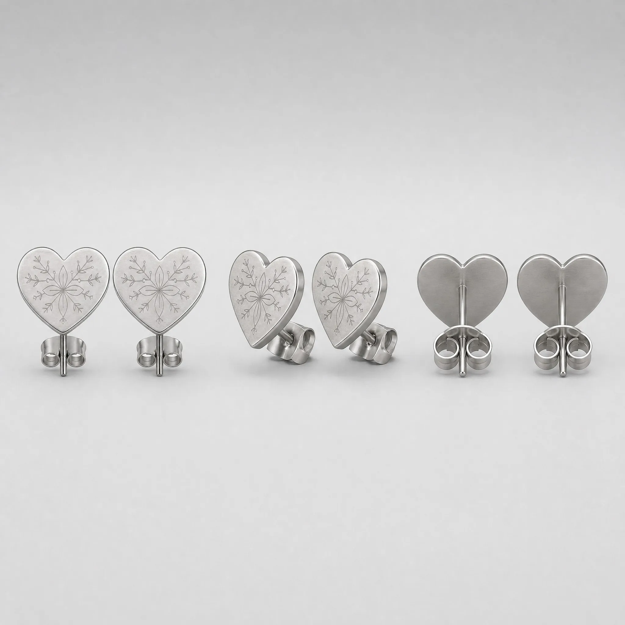 Laser engraved heart earrings multi-angle view