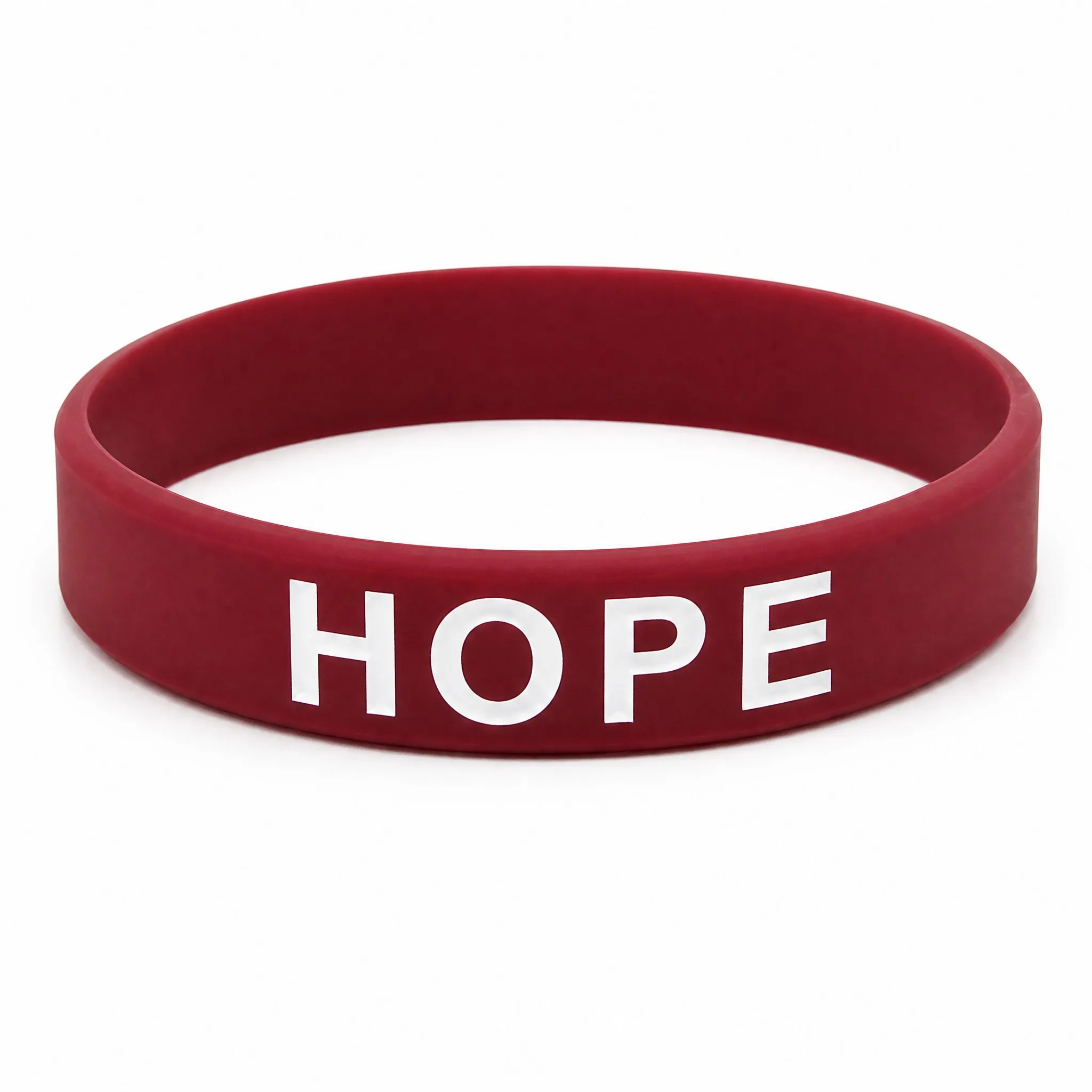 Custom ink injected silicone bracelet with white color filled HOPE lettering on white background