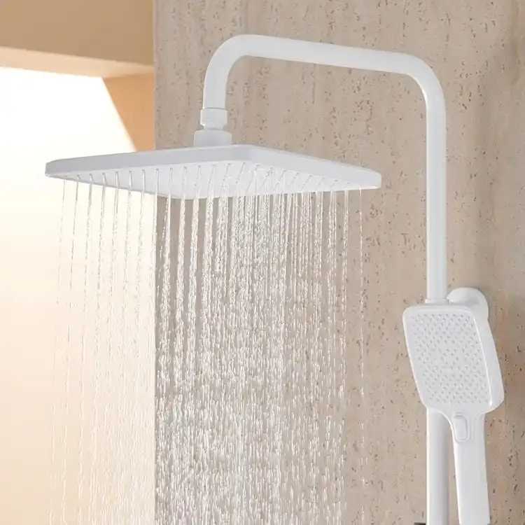Overhead Rain Shower Spray in Luxury Travertine Bathroom piano-key-white-shower-set-scene