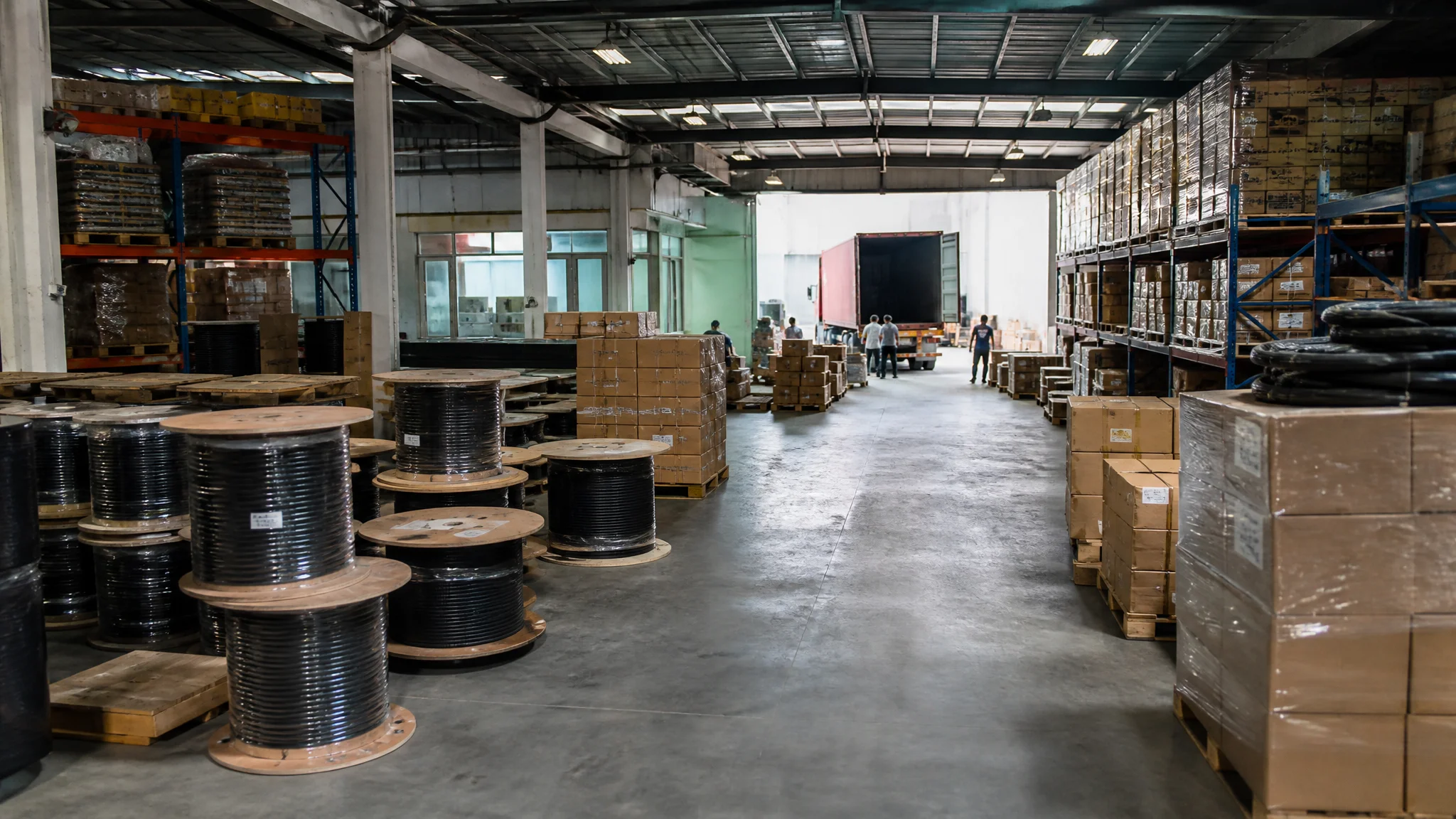 HDMI cable wholesale warehouse in China with stacked cartons and a loading bay