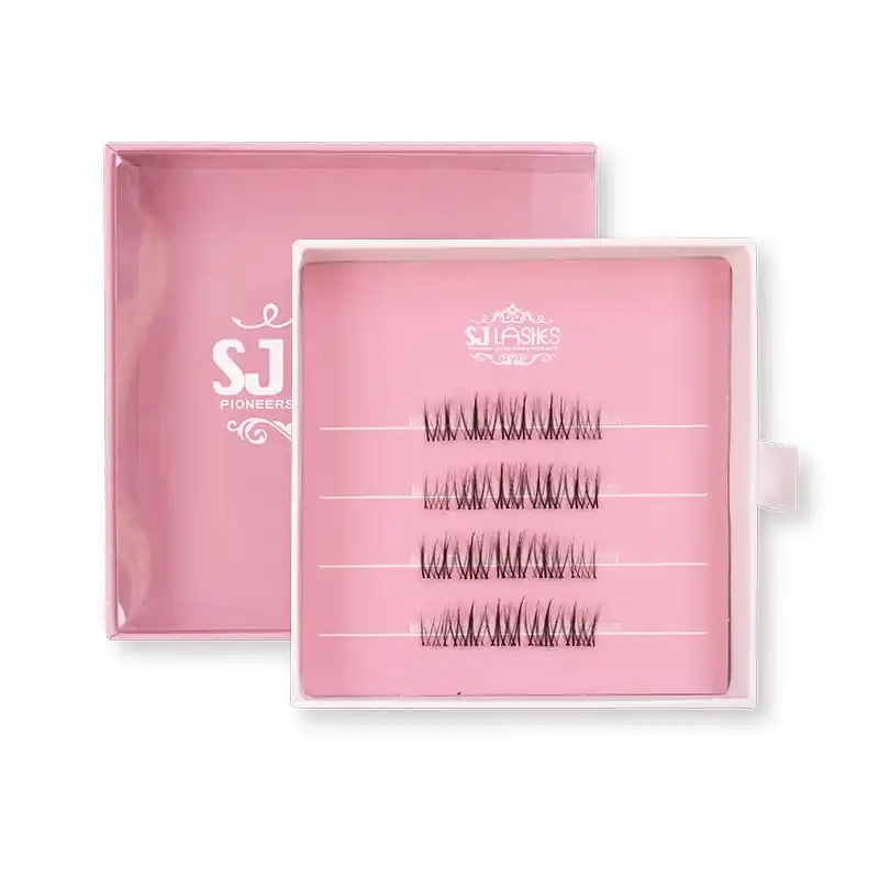 Pale paper tray insert with four rows of lash clusters and printed brand mark, pink box behind, pull tab at the side - paper tray lash insert