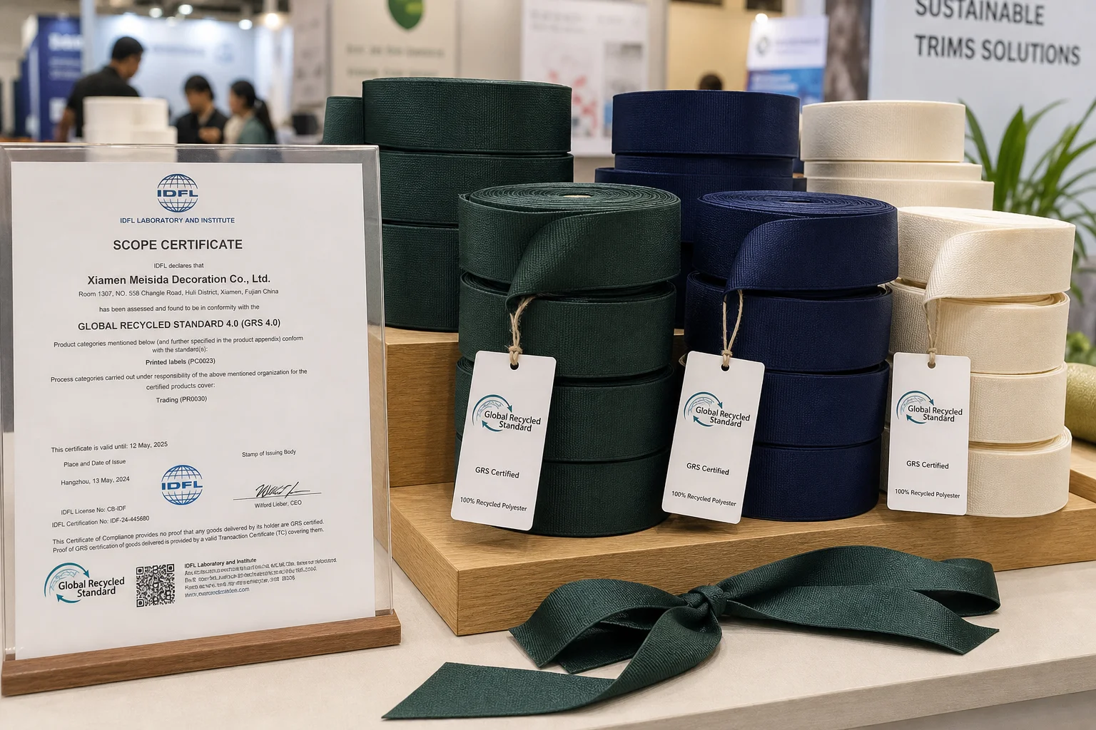 GRS-certified recycled polyester ribbon rolls with certification tags on trade display