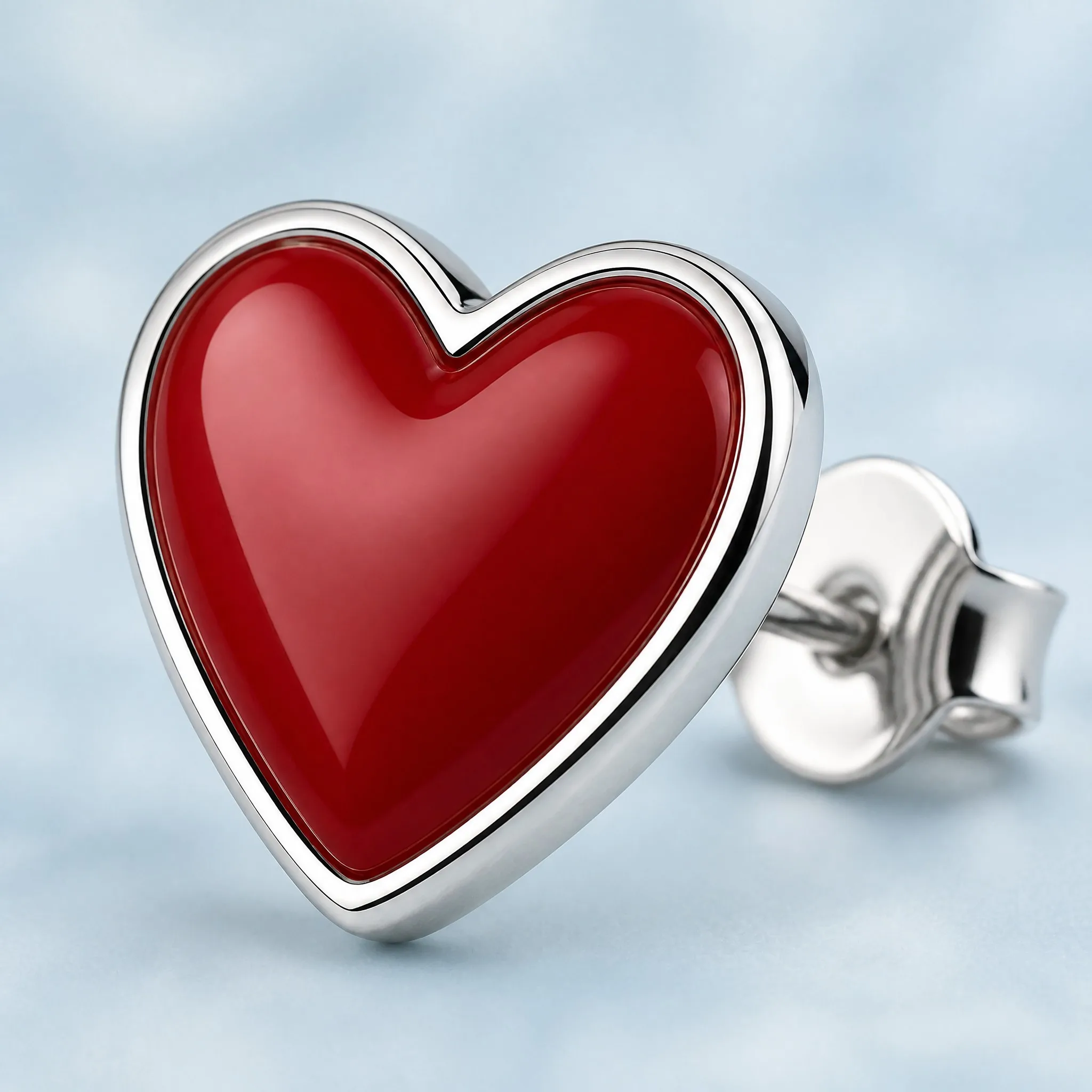 Hard enamel heart earring macro detail