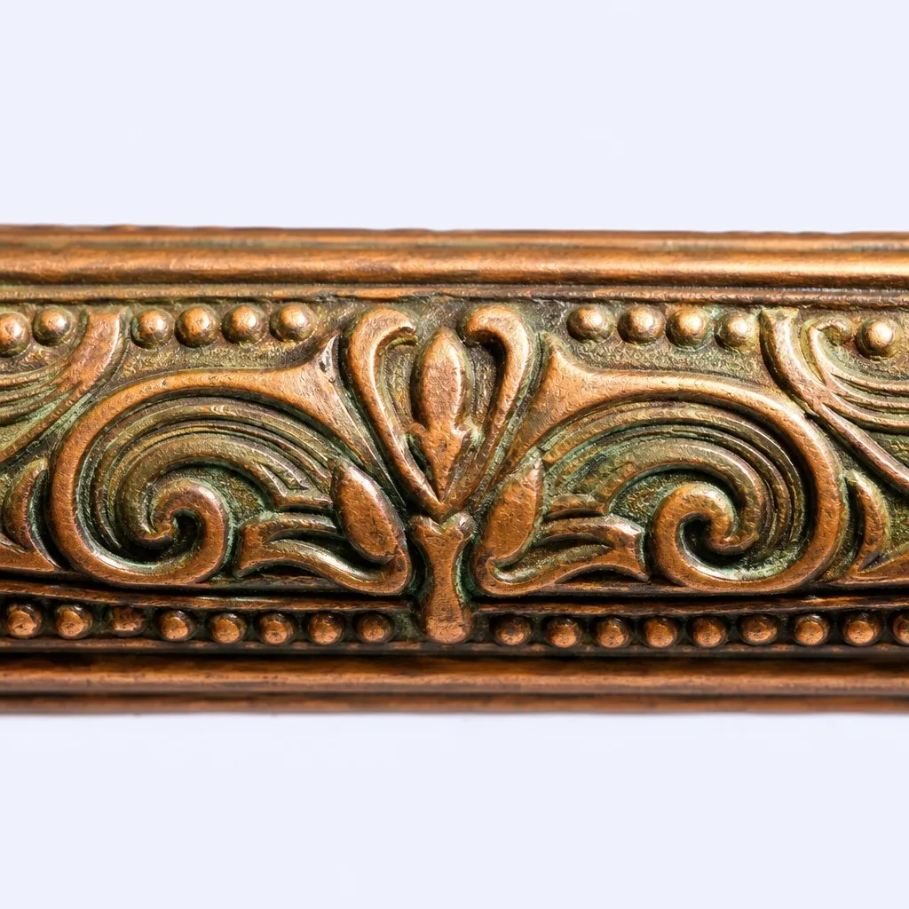 Antique copper engraved pen grip zone close-up