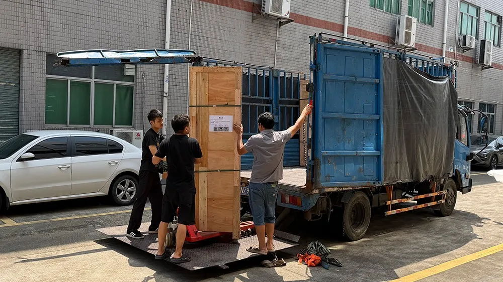 Wooden shipping crate containing the Derui DR-H501-IPX7 water immersion test chamber being loaded onto a truck for shipment to Spain