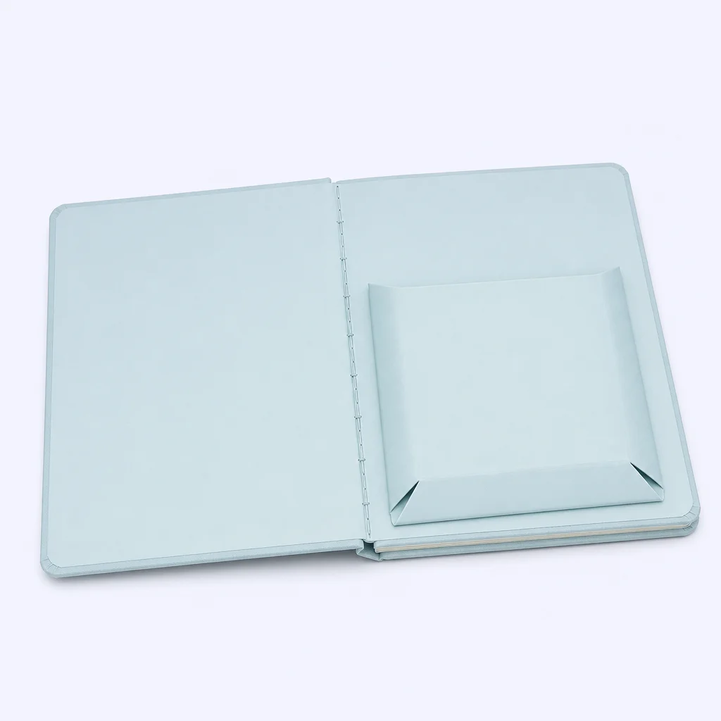 Lay-Flat Binding and Expandable Pocket