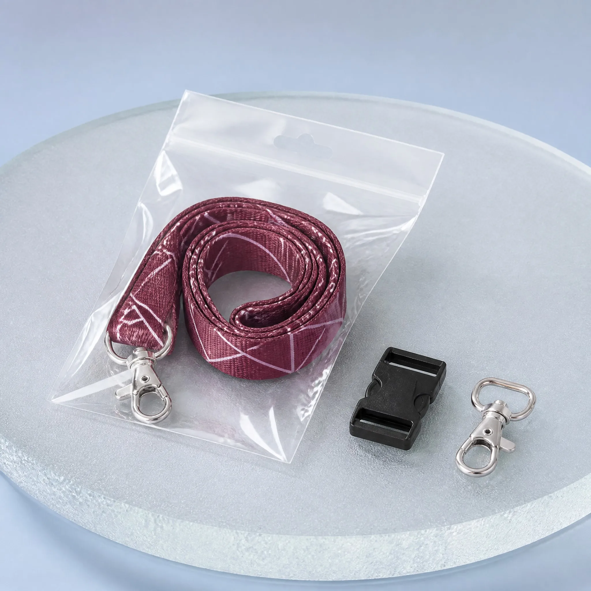 Lanyard packed in transparent OPP bag with spare breakaway safety buckle and extra clip