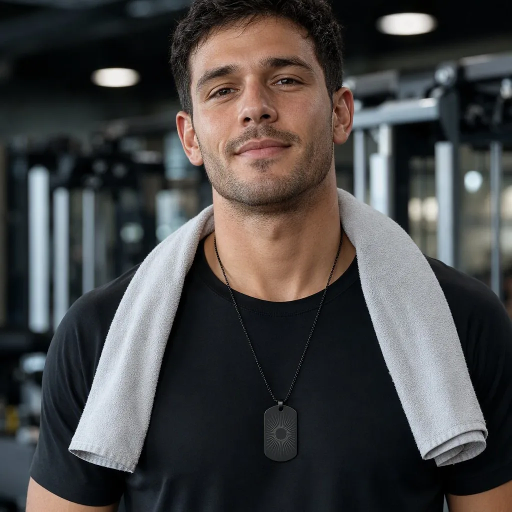 Matte black sunburst dog tag worn after workout