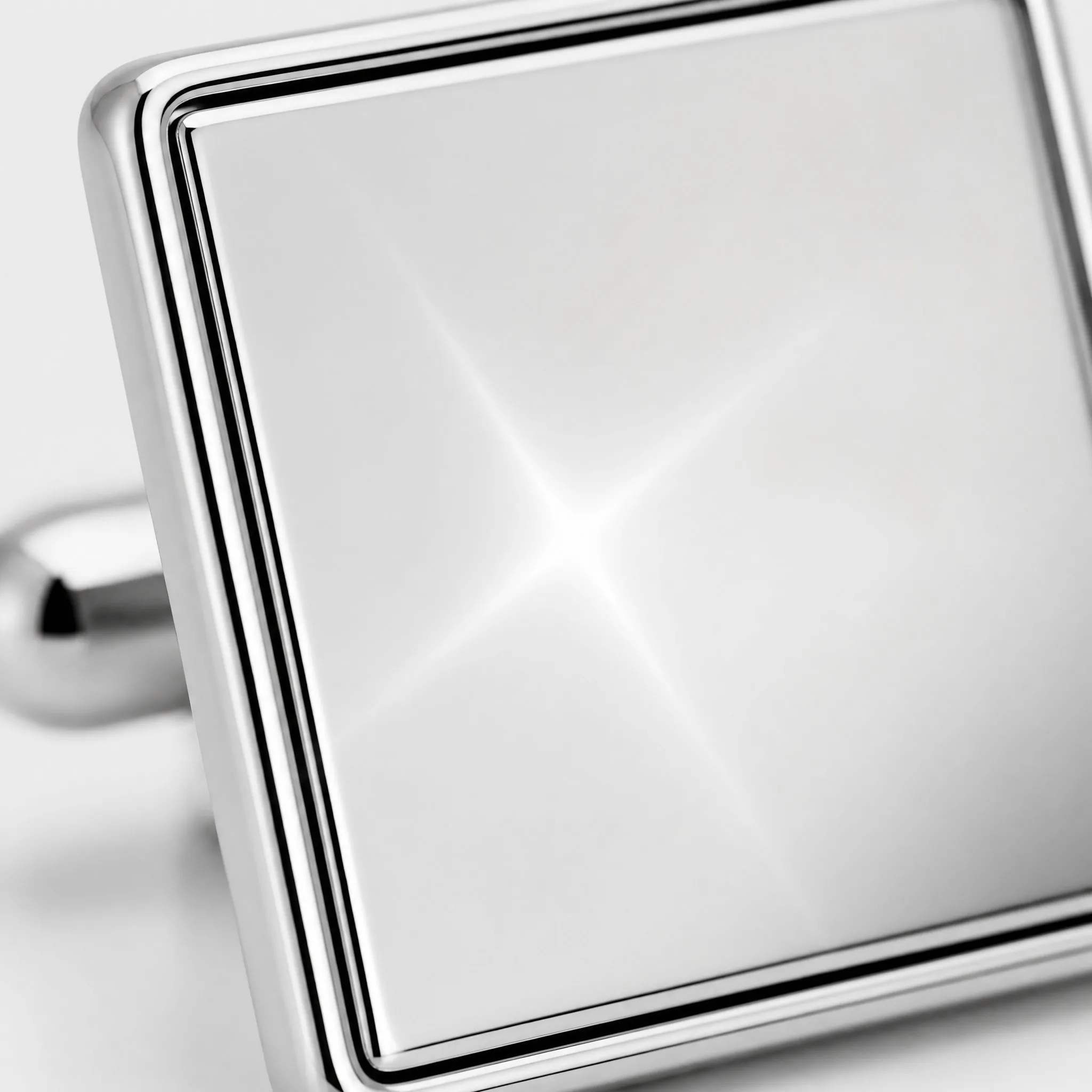 Magnetic cufflinks macro mirror polish detail