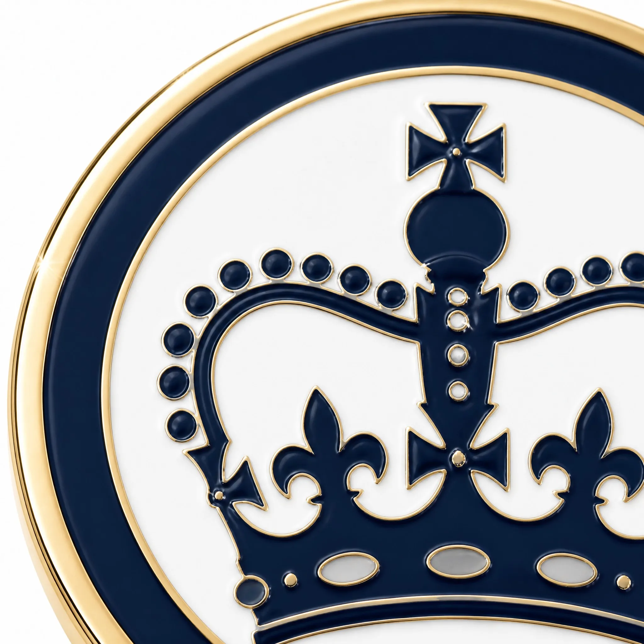 Macro detail of hard enamel crown emblem