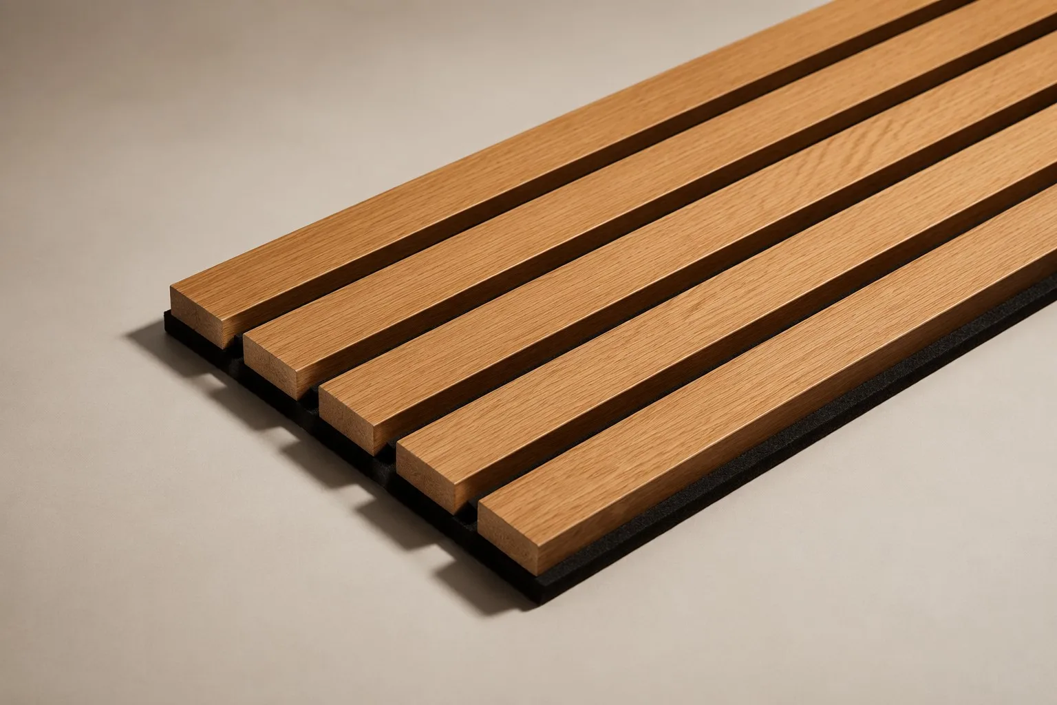 Close-up macro detail of wooden slat panel — real oak wood veneer directly bonded to black acoustic felt, no middle layer