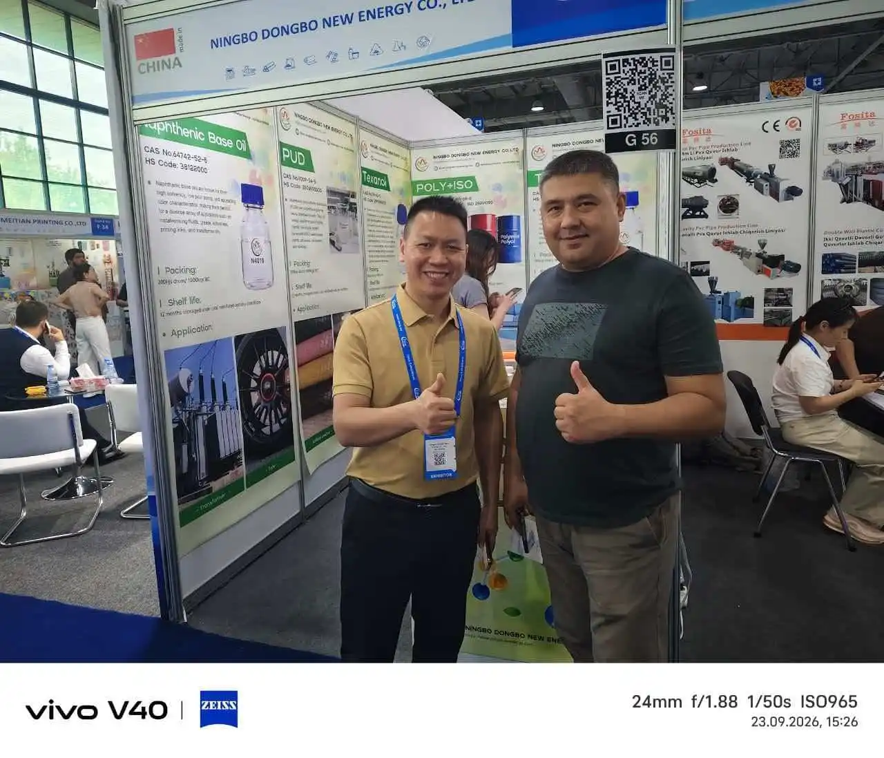 Dongbo New Energy representative meeting a visitor at Stand G56