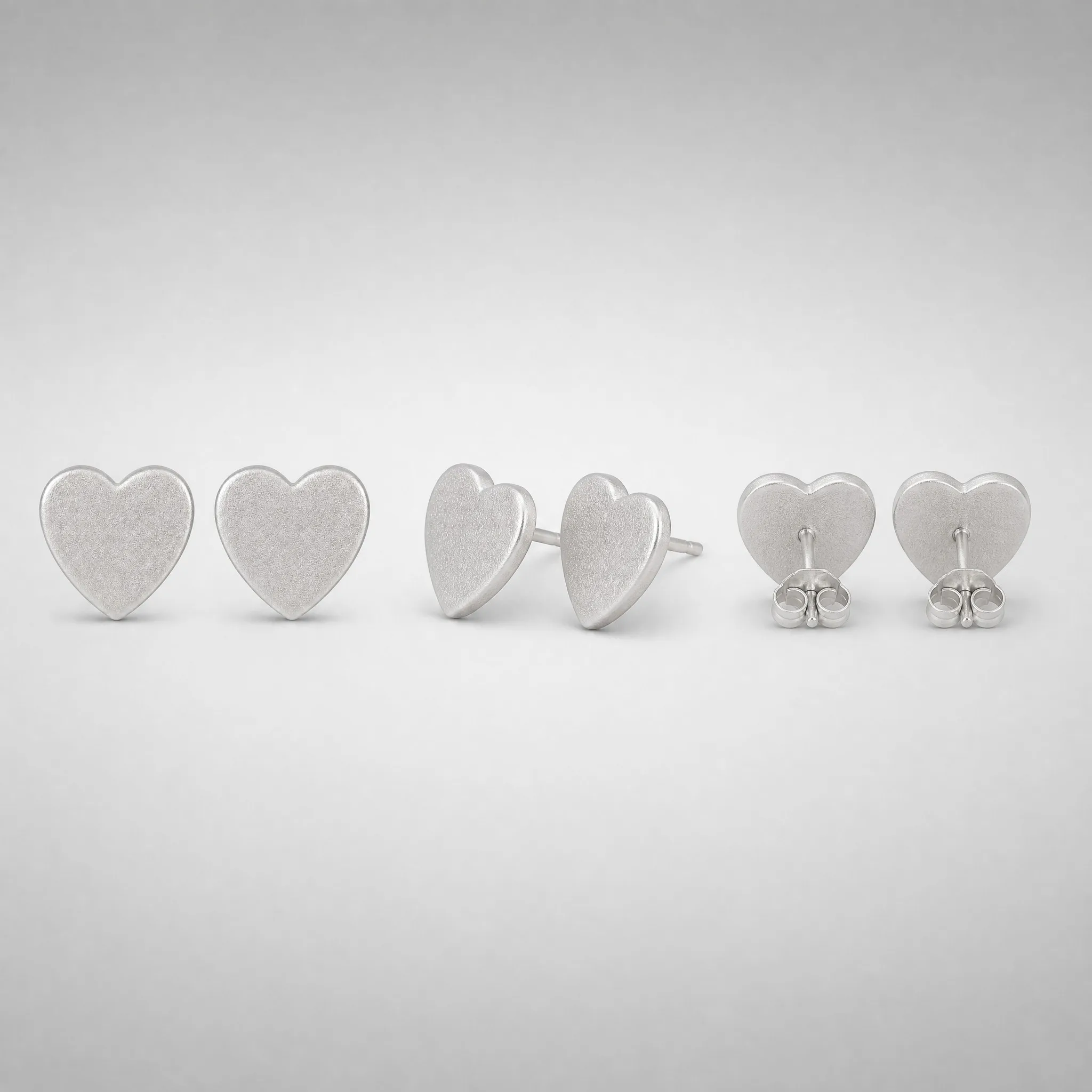 Sandblasted heart earrings multi-angle view