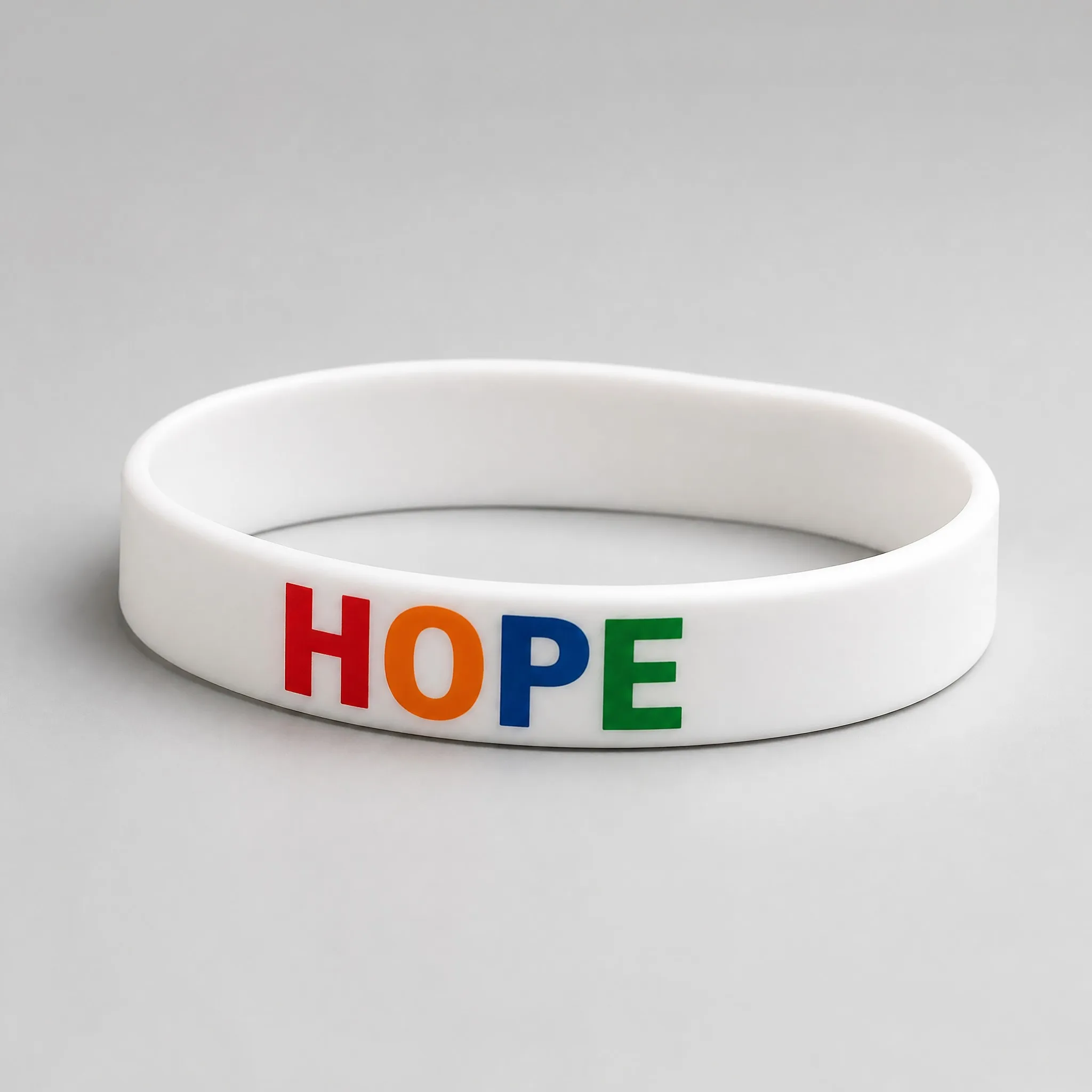 Three-quarter angle view of CMYK printed silicone bracelet