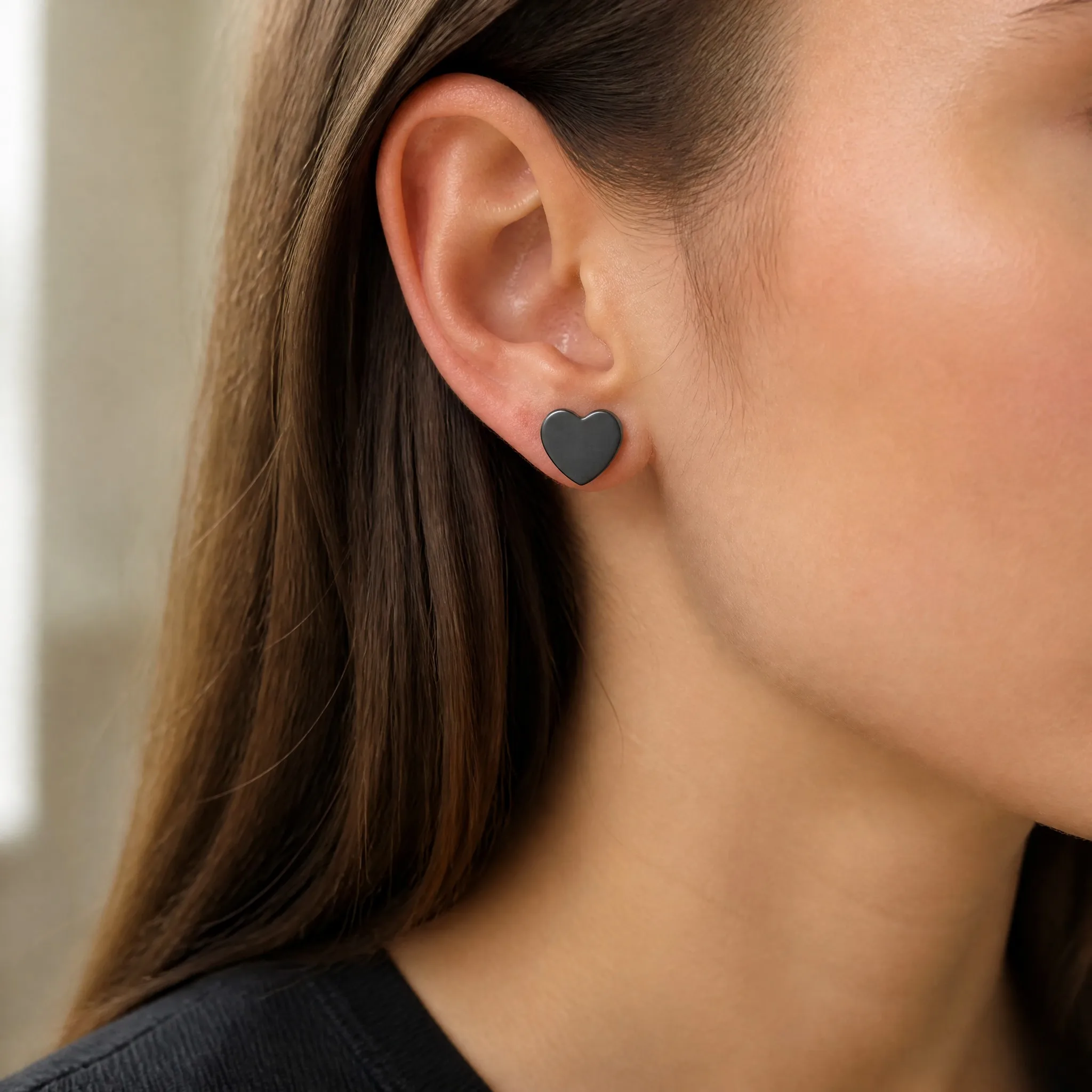 Wearing PVD heart stud earrings