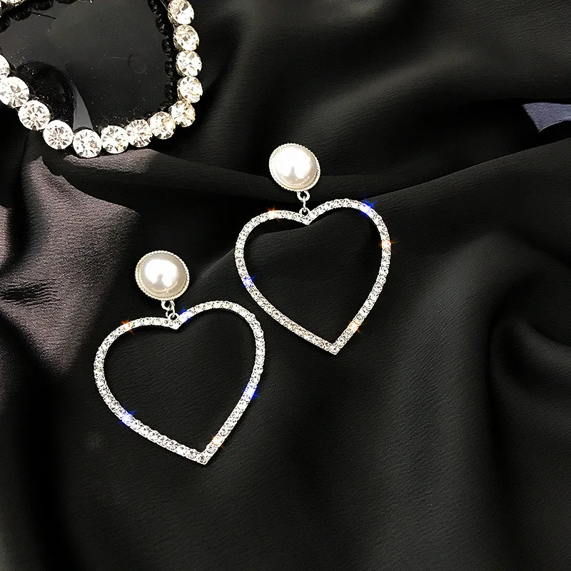 

fashion pearl earrings with crystal heart