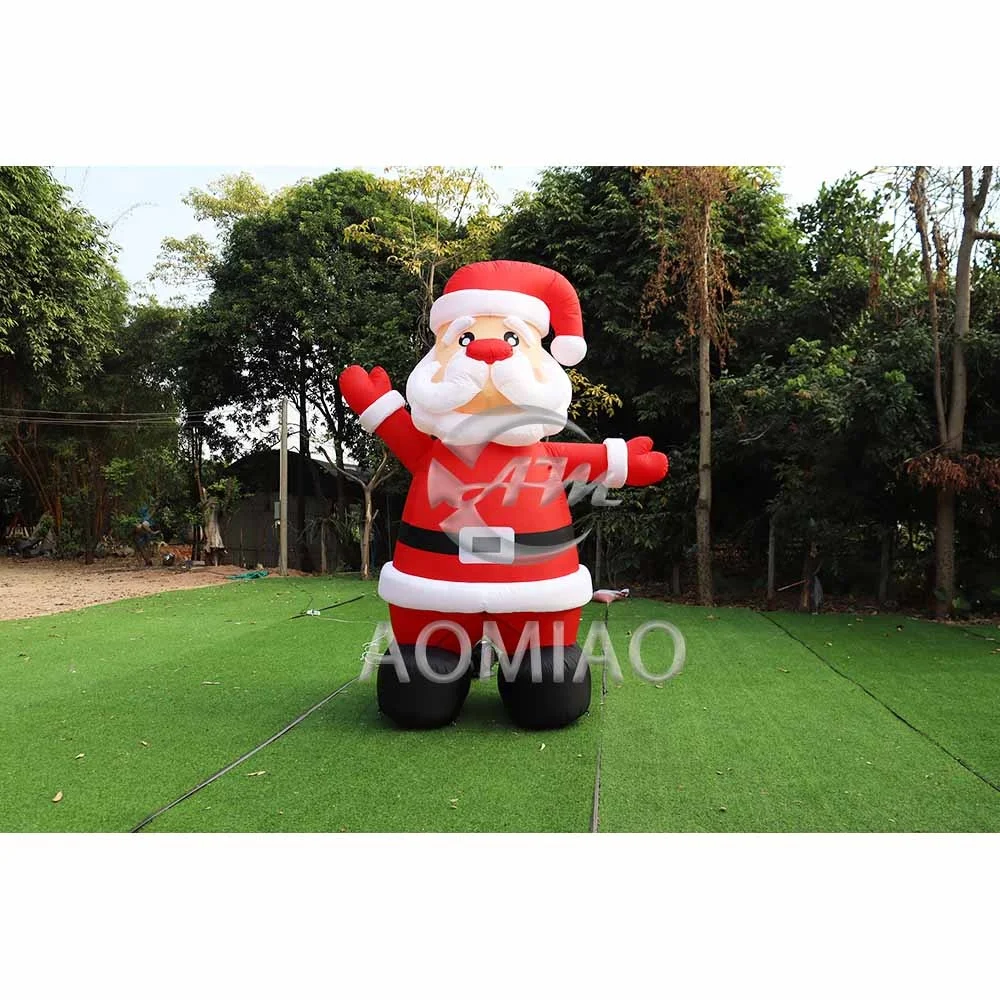 

Outdoor inflatable santa claus commercial inflatable surfing santa for sale