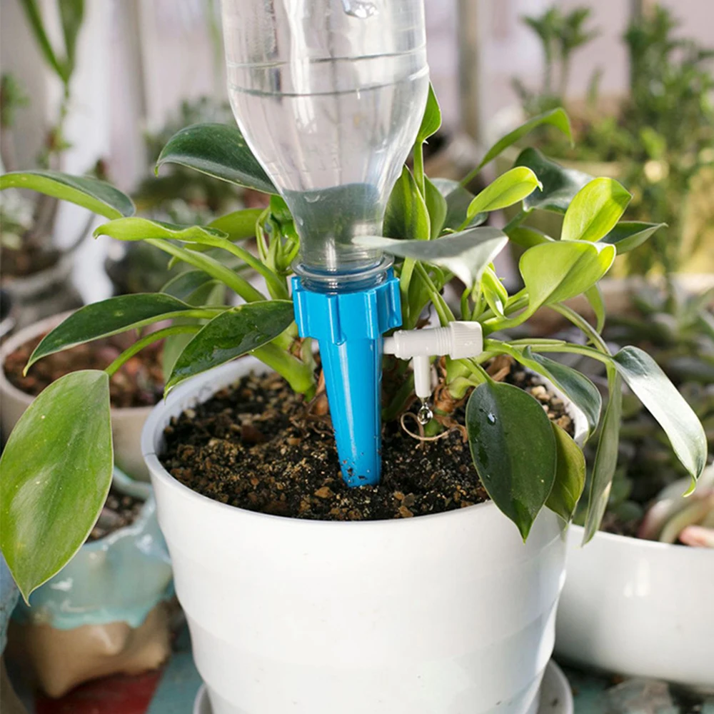 

Hot Sale Auto Drip Irrigation System Automatic Watering Spike For Plants Flower Indoor Household Water Bottle Drip Irrigation